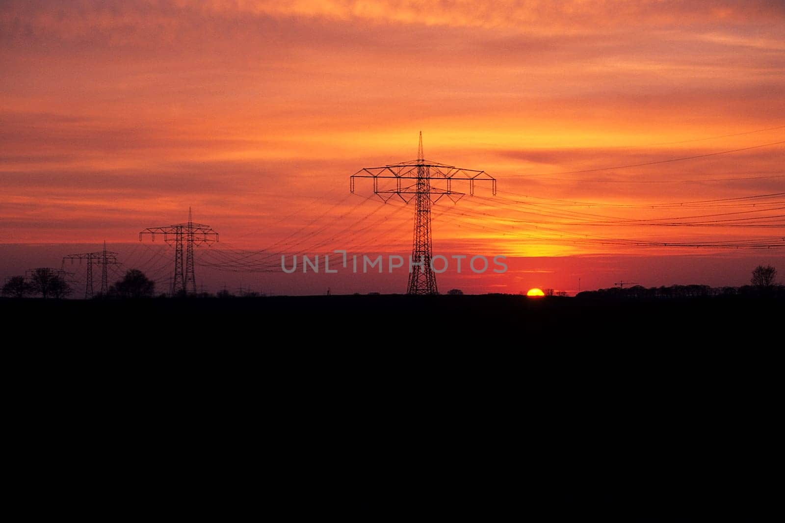 High-voltage current in the evening light