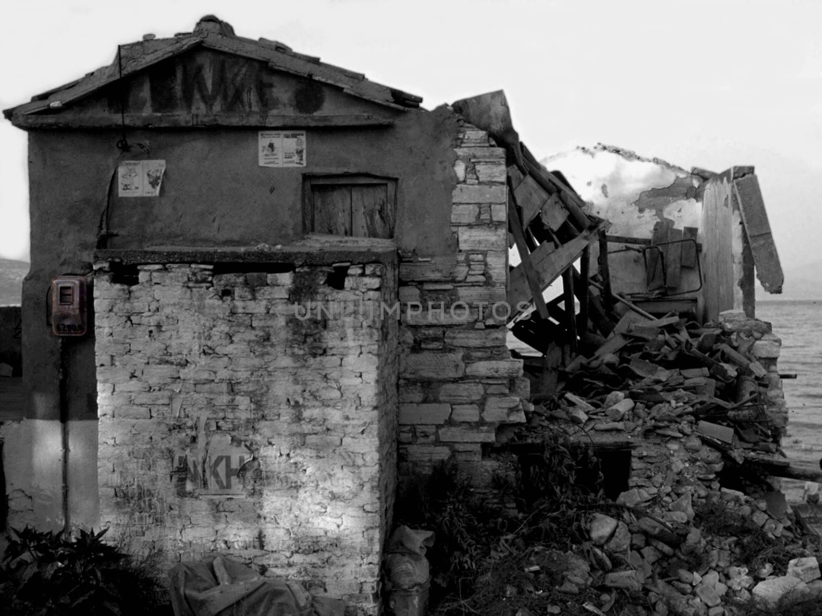 Taken on Samos,Greece in 1990 (slide scan) I converted the image to grayscale and left the electricity meter in color.