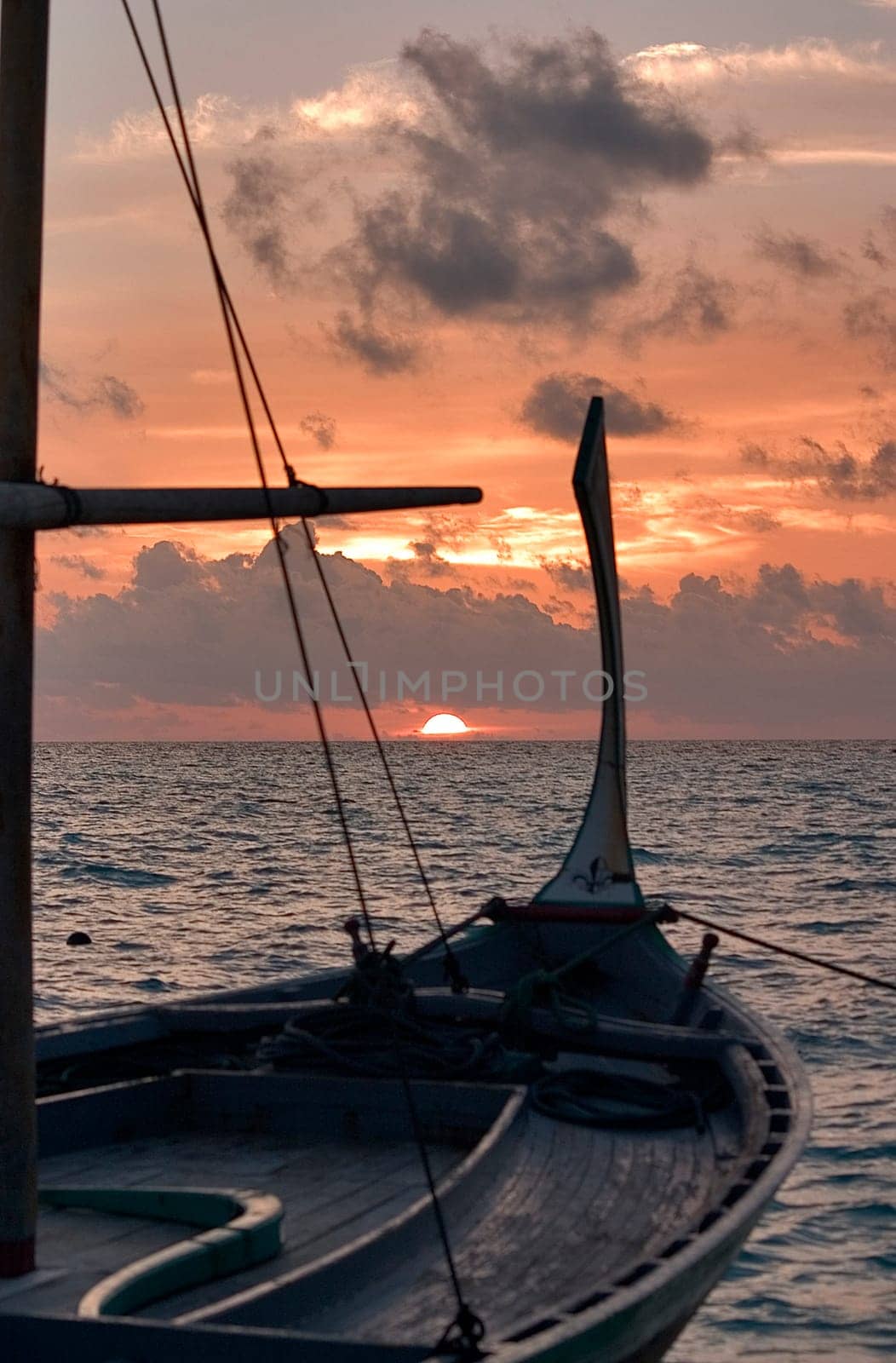 Dhoni at sunset,Maldives