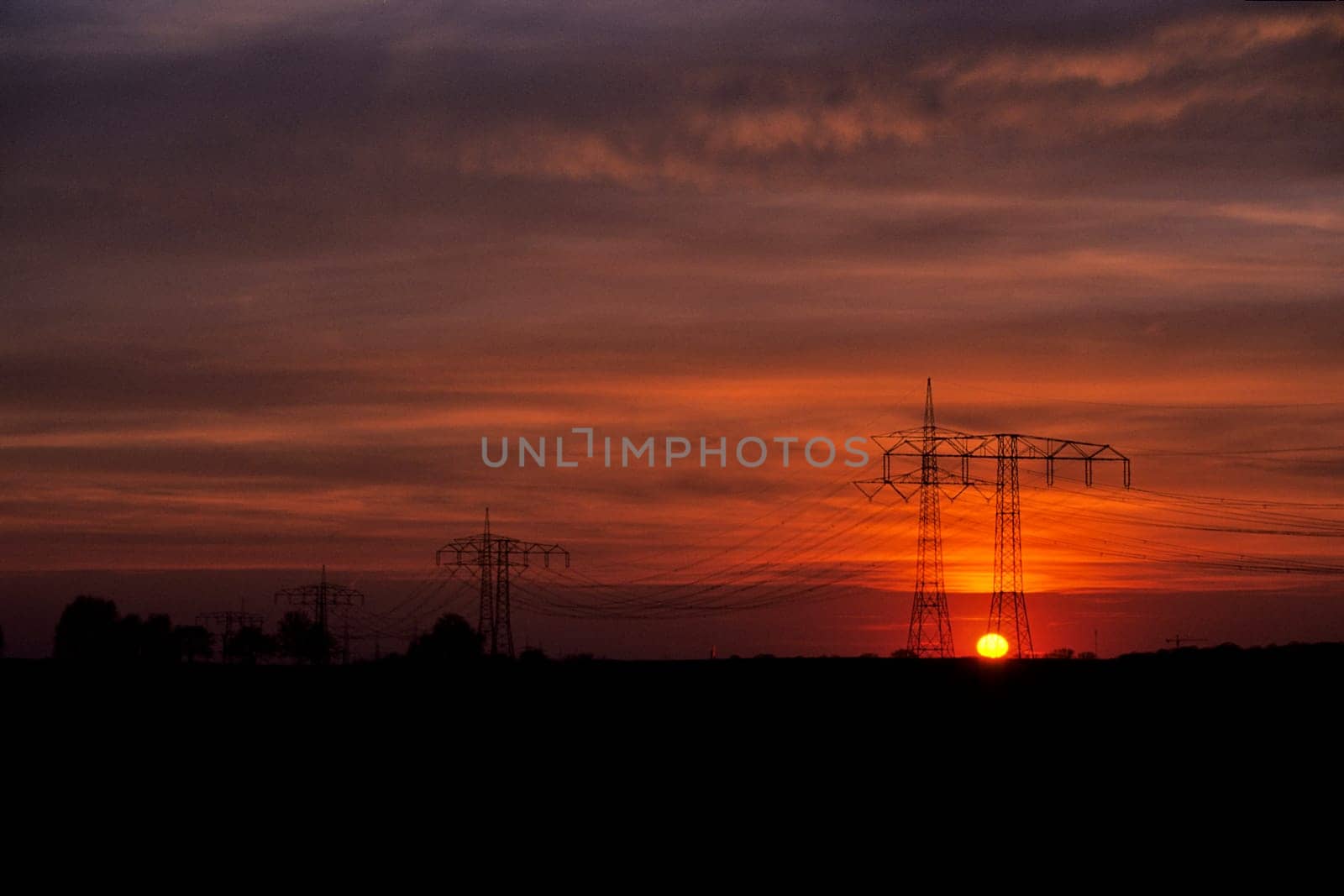 High-voltage current in the evening light