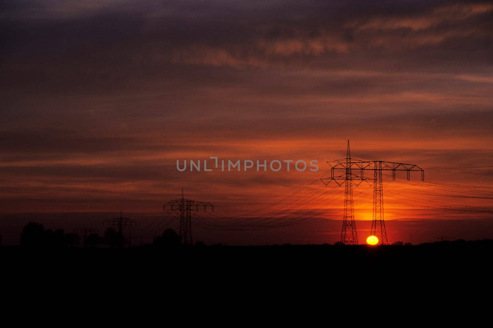 High-voltage current in the evening light
