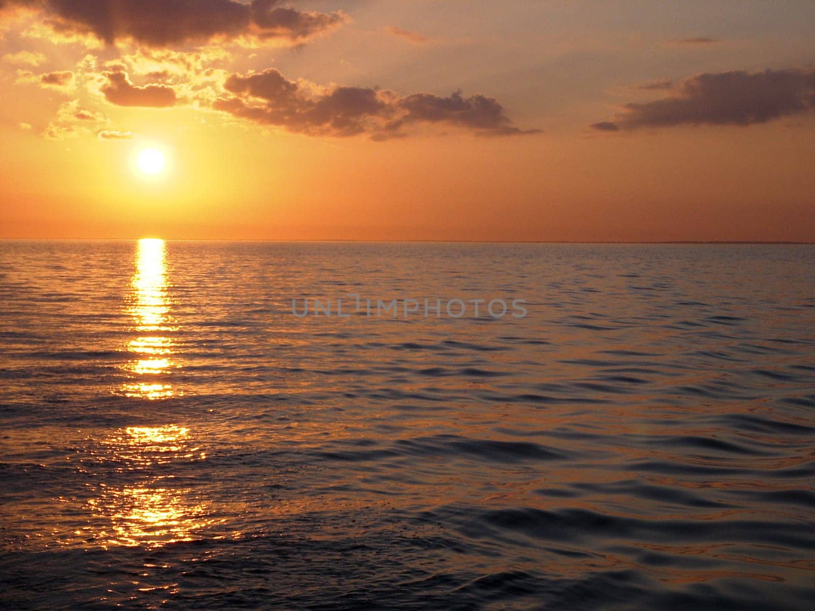 8:58 p.m. - All good things come in threes. Here is the introduction to the sunset on the Baltic Sea. Now it's over,at least for the time being  -)