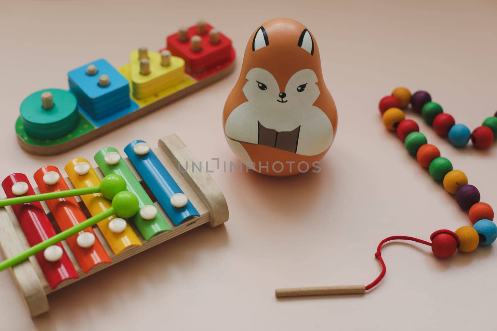 Bright musical instruments for children, colorful xylophone. Eco-friendly colored wooden educational toys. Montessori.