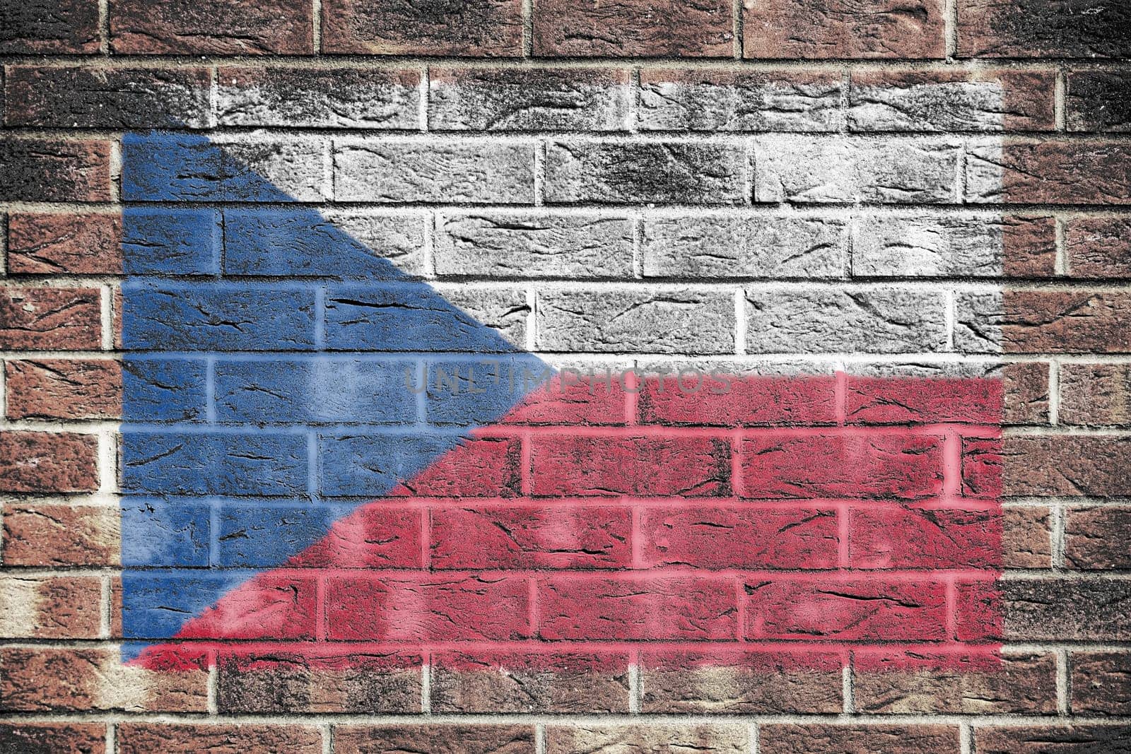 A Czech flag painted on brick wall background