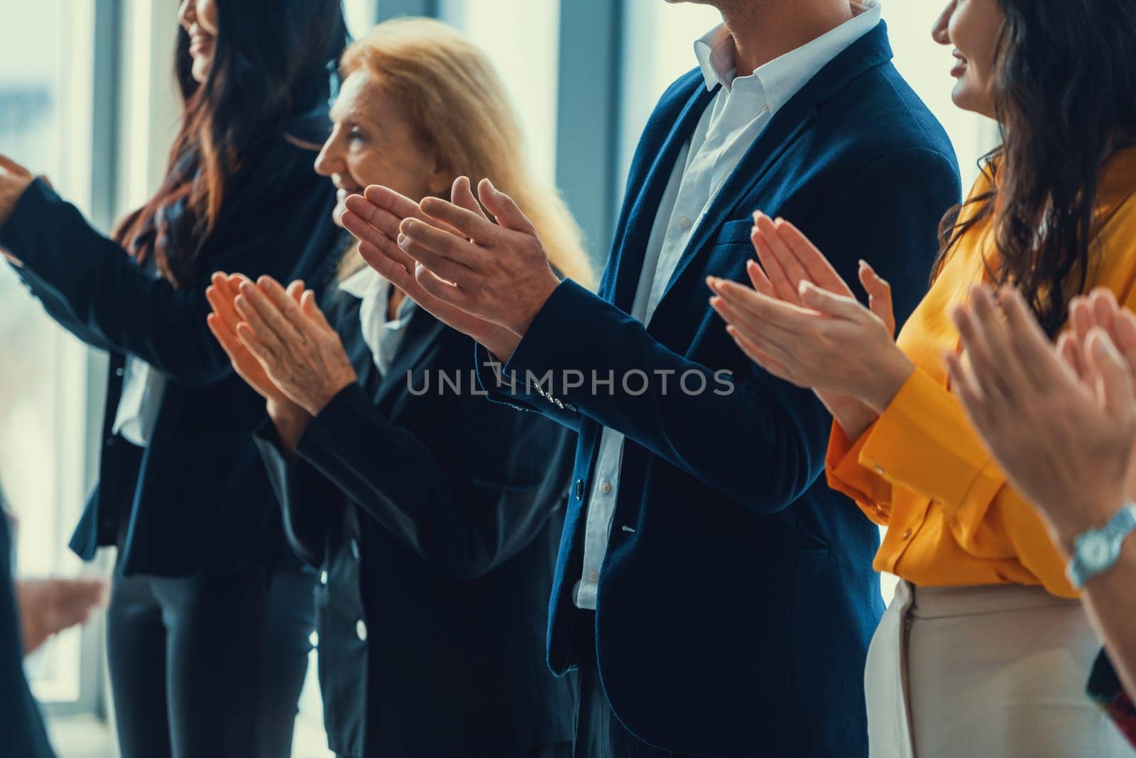 Business people clapping hands at successful presentation. Intellectual. by biancoblue