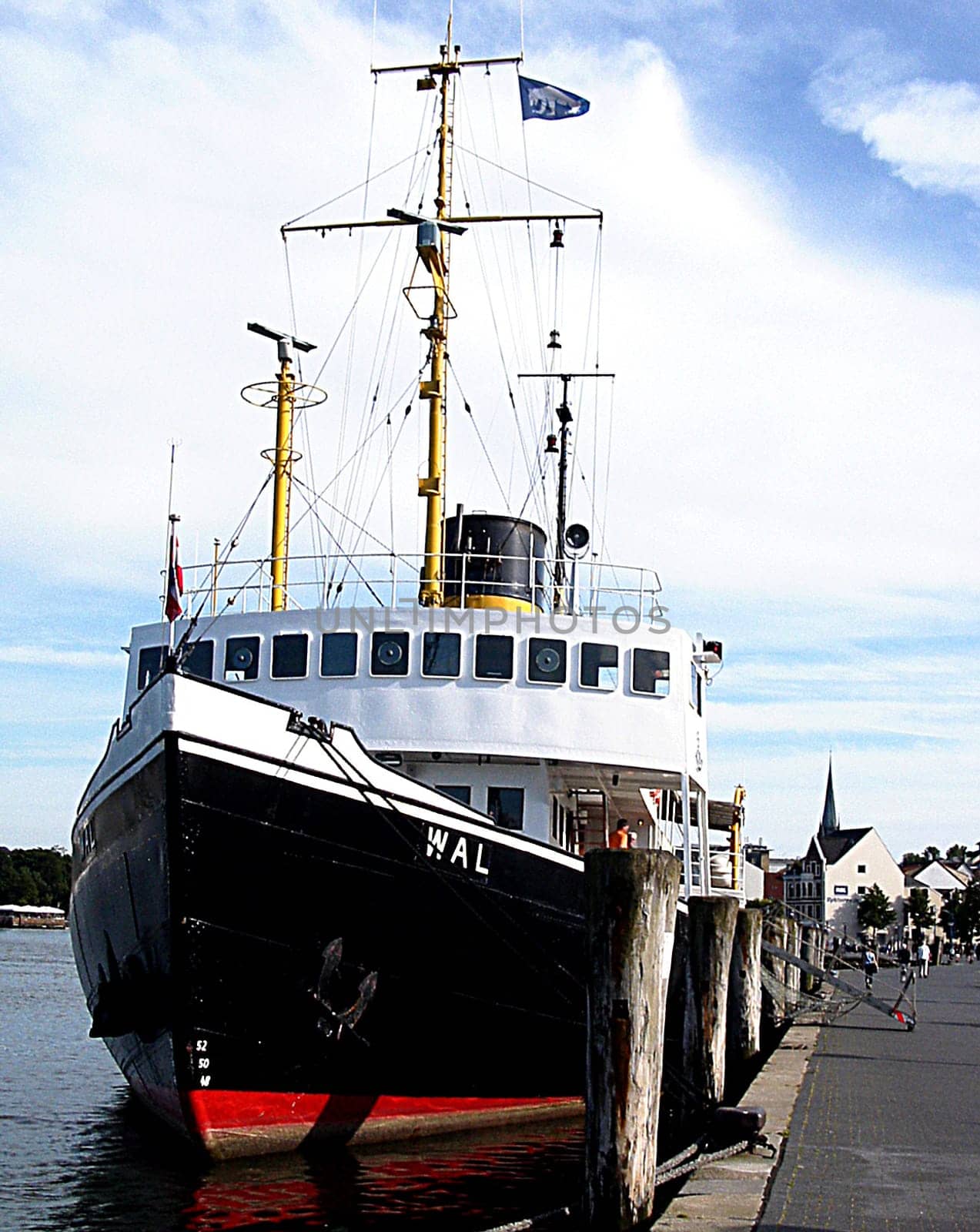 In 1938,the steamer "Wal"" was put into service at the Szczecin Oder Works for icebreaking services on the Kiel Canal. Photographer in the city harbour of Flensburg"