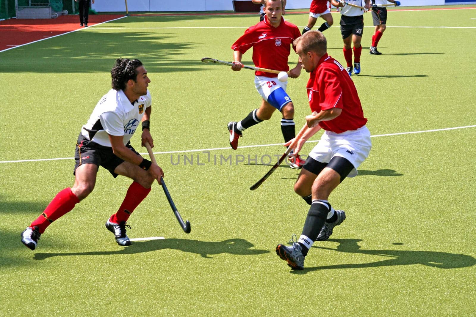 The picture was taken on 24.07.05 at the international hockey match between Germany and Poland. Final score 5:0 for Germany. In the foreground you can see the Polish player Kluczynski and in white for Germany Navedo Gonlales from UHC Hamburg.