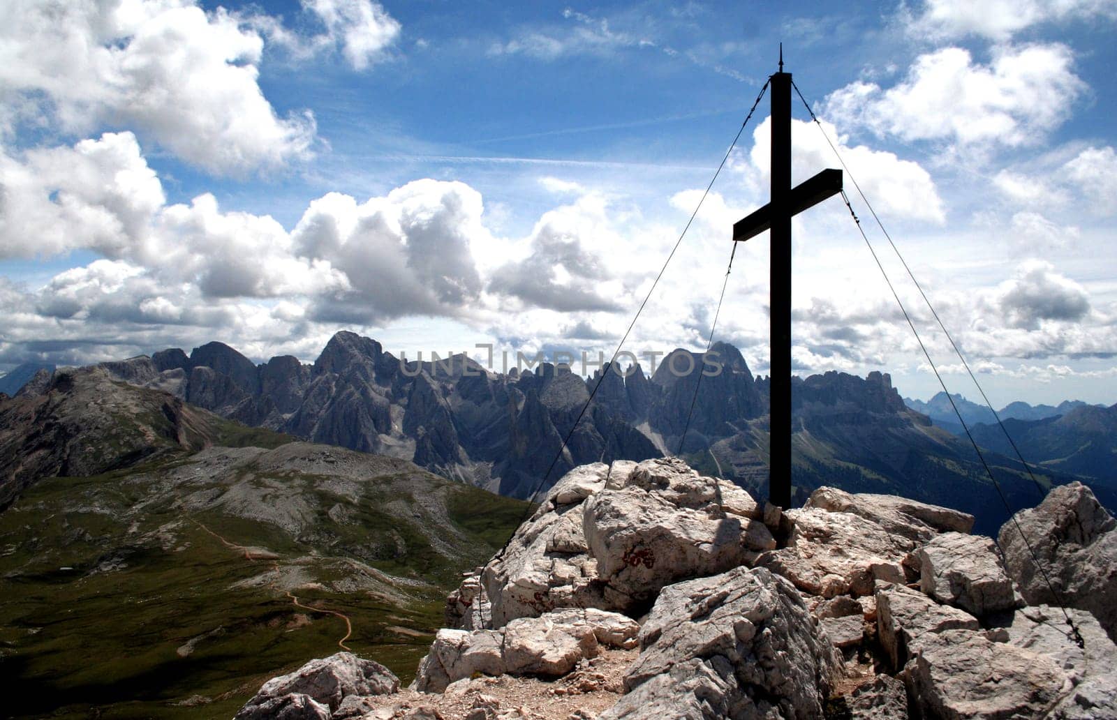 Gripfelkreuz on Monte Pez - the highest point on the Sciliar (2564) in the background you can see the Catinaccio - to the left of the cross the Vajolet towers and about 1cm to the right of the cross is the well-known "Gartl"""