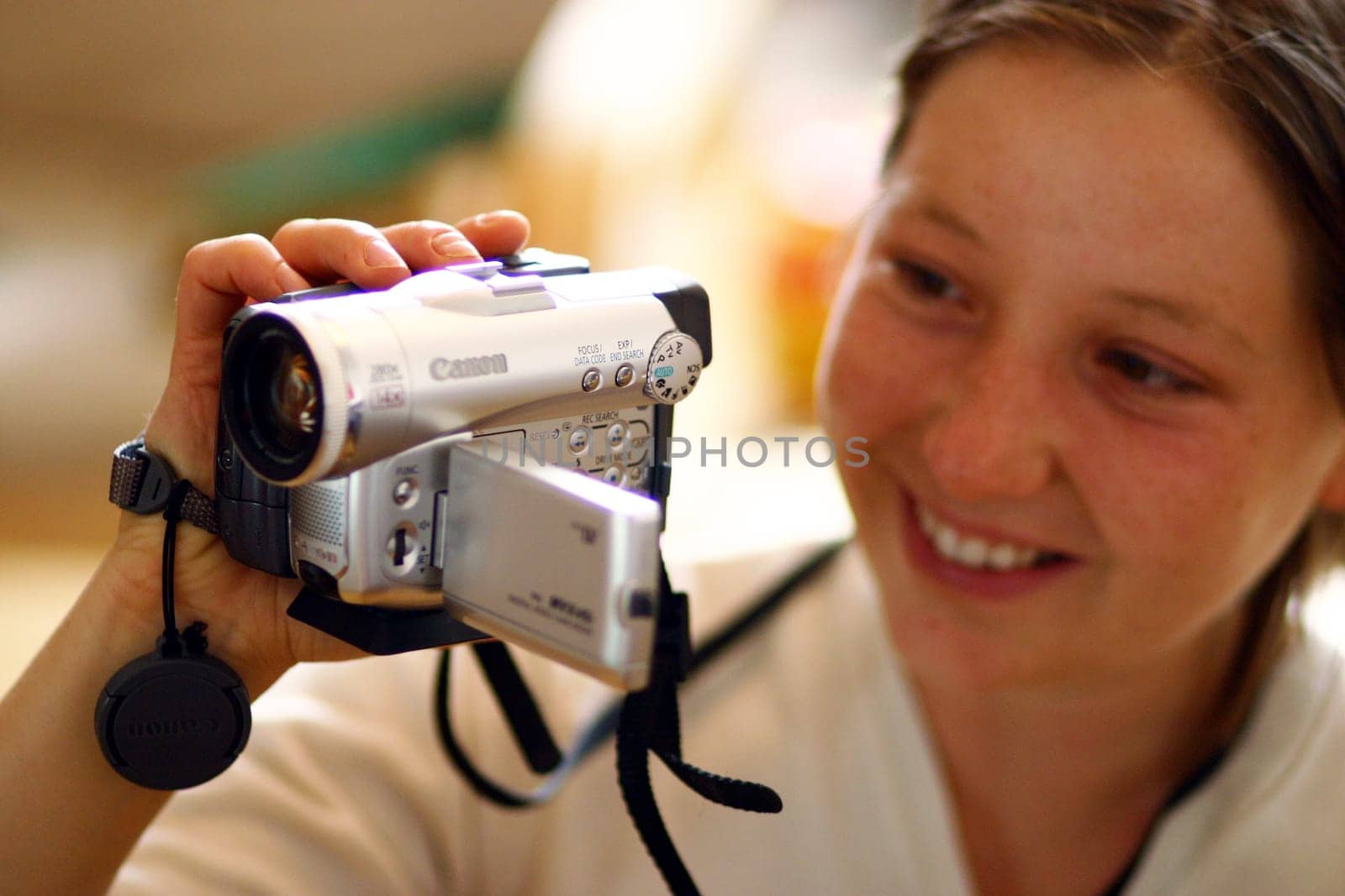 Young woman with camera