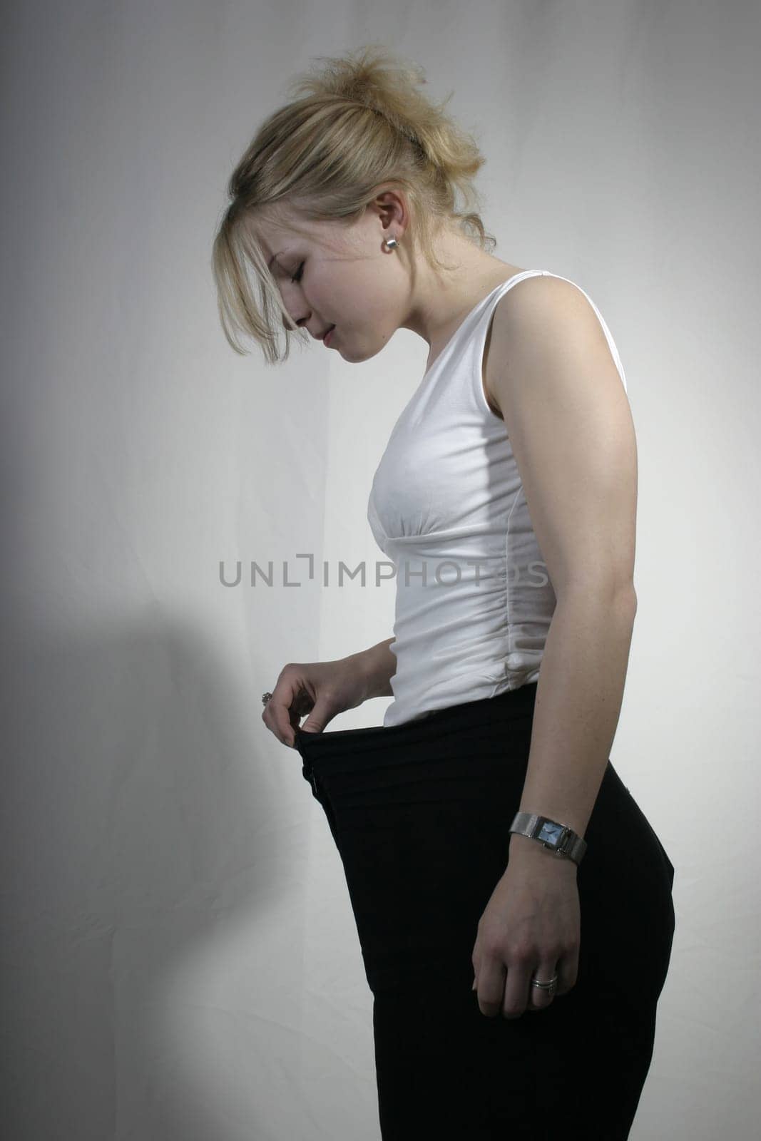 Woman on the scales - serial picture 1 of 3