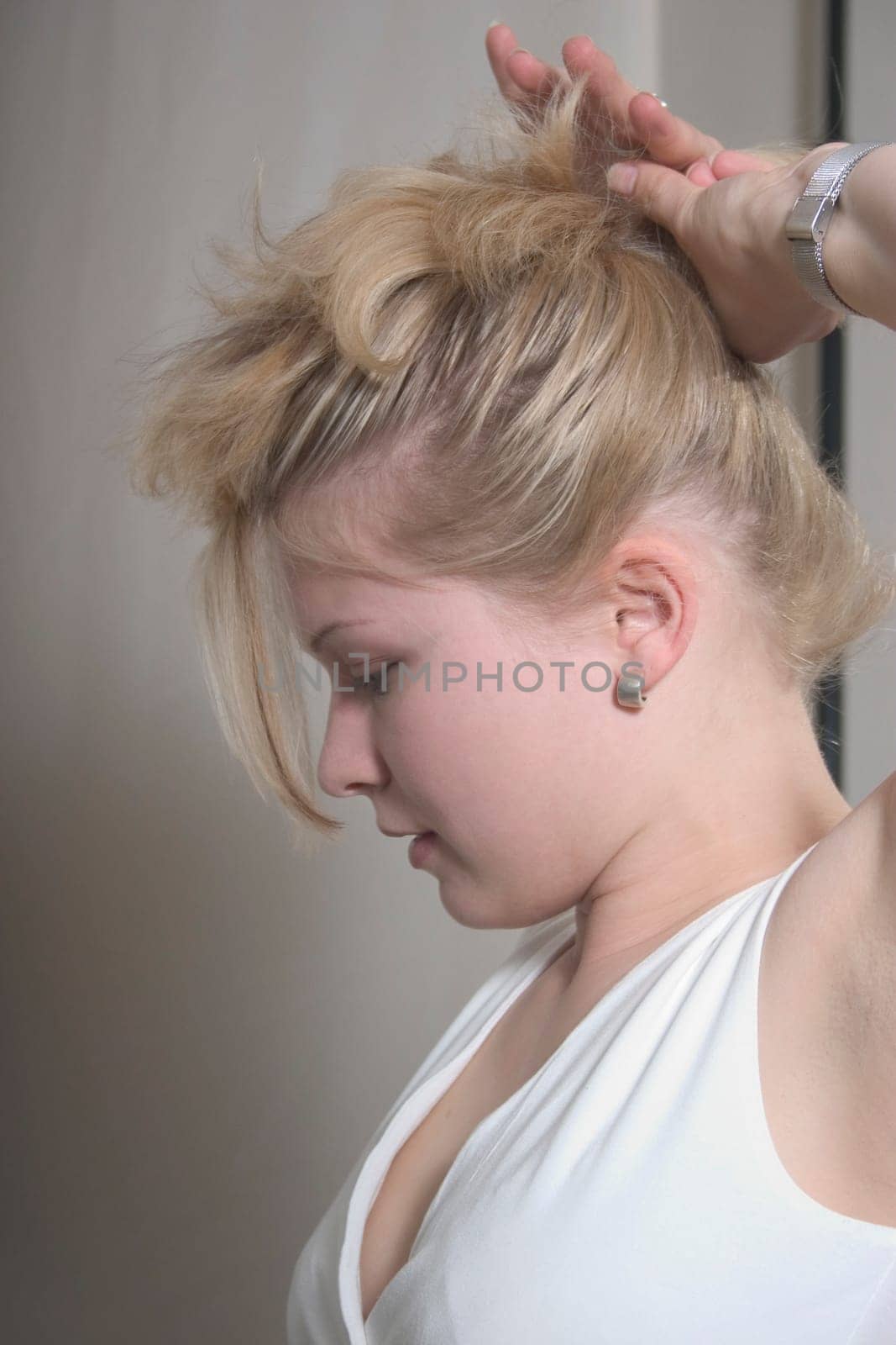 Putting on an updo - continuous shot 2 of 9