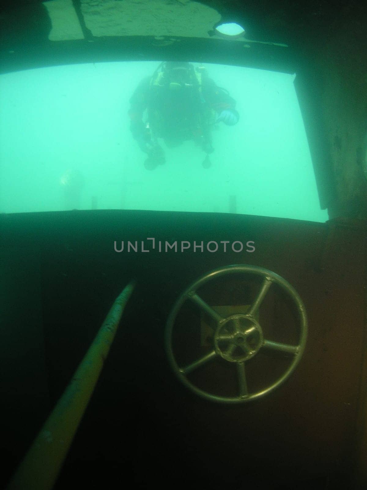 "Hit the wall with the barge!"" and then divers look in the window!"
