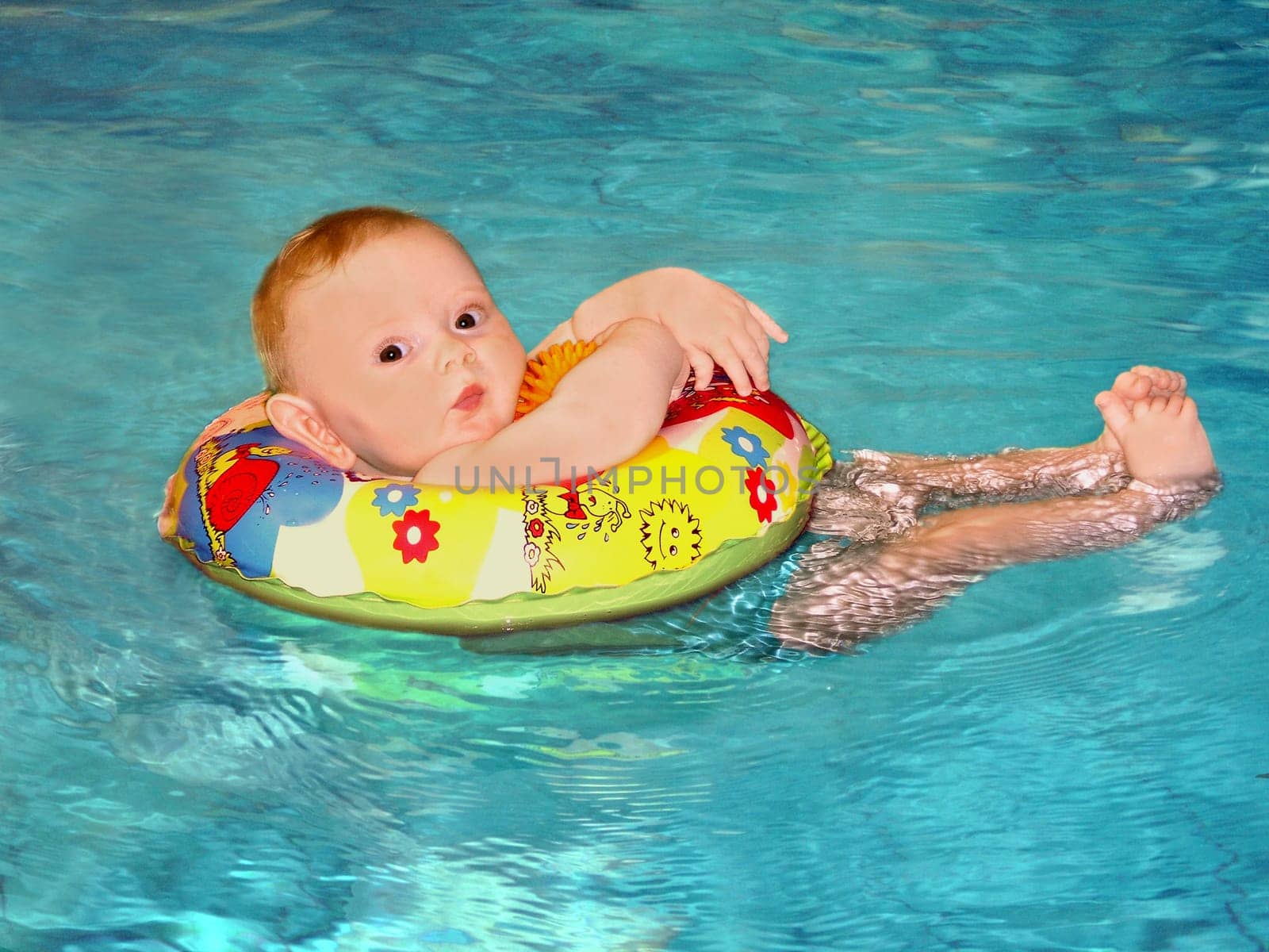 My daughter (6 months old) baby swimming.