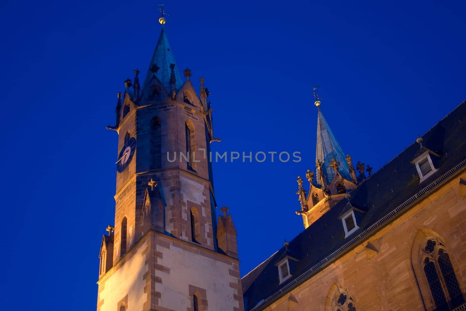 the St. Gallus Church in Ladenburg,an old Roman town,at the blue hour. Thanks to Ueli for the suggestion to change the white balance a bit more,so that the sandstone colors come into their own,but the sky is now so w