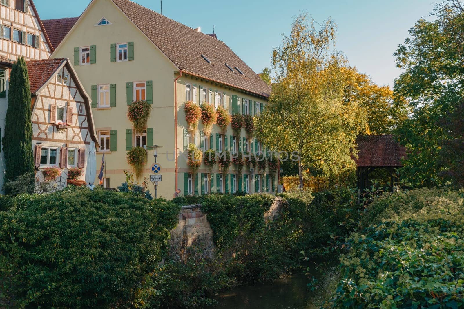 Old national German town house. Old Town is full of colorful and well preserved buildings. Baden-Wurttemberg is a state in southwest Germany bordering France and Switzerland. The Black Forest, known for its evergreen scenery and traditional villages, lies in the mountainous southwest. Stuttgart, the capital, is home to Wilhelma, a royal estate turned zoo and gardens. Porsche and Mercedes-Benz have headquarters and museums there. The 19th-century Hohenzollern Castle sits in the Swabian Alps to the south.