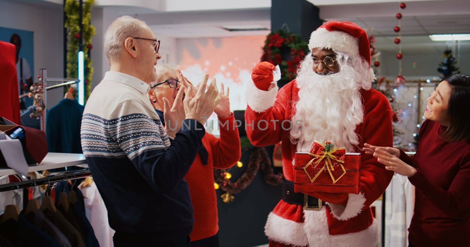 Santa Claus employee draws raffle winner by DCStudio