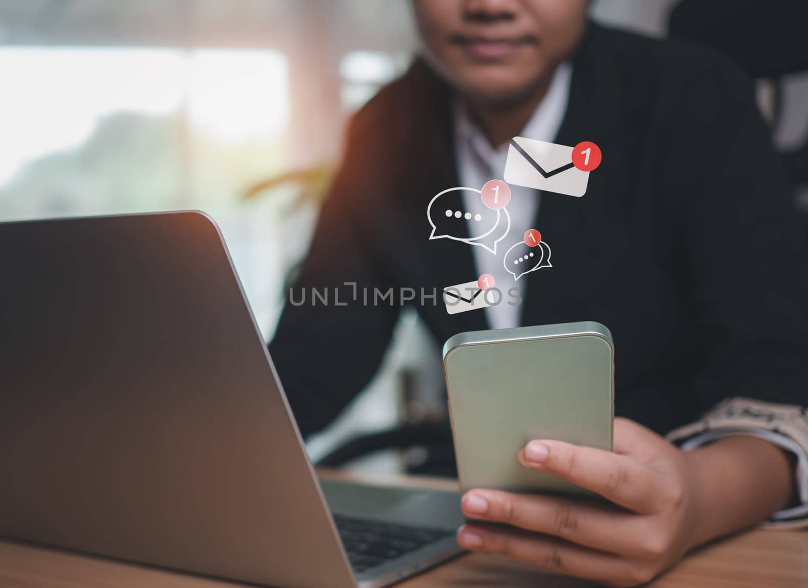 Businesswoman uses smartphone to check new email. New email notification ideas for business email communication and digital marketing. Electronic message notifications. Internet technology.