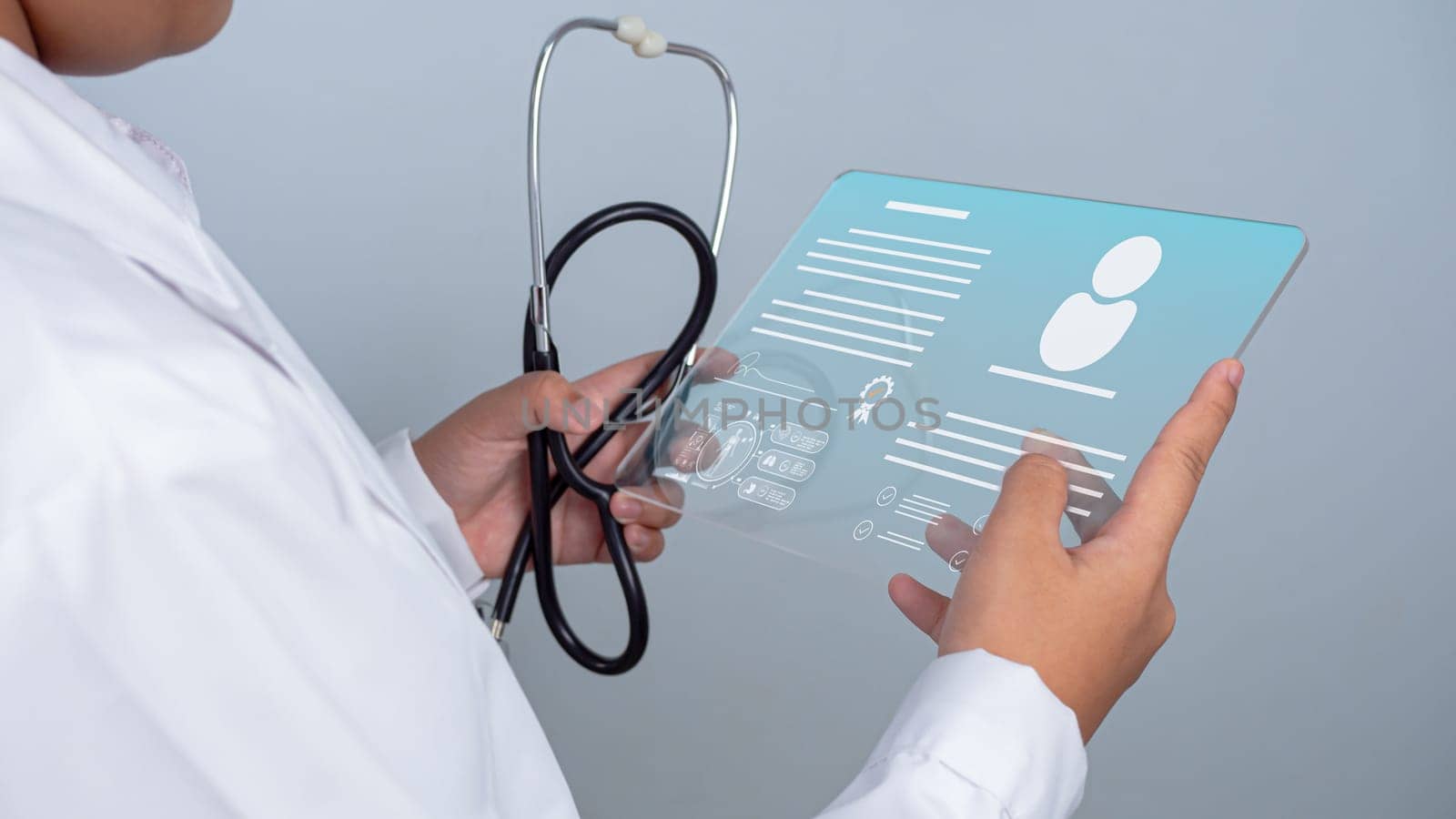 The doctor signs a document approving the patient's treatment. medical concept. medical treatment concept. by Unimages2527