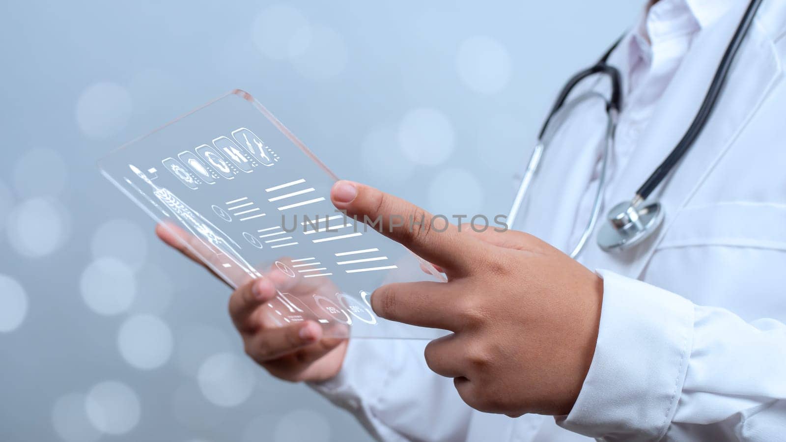 Doctor is using show screen for medical diagnostic analysis on modern virtual screen network connection. Medical technology concept.