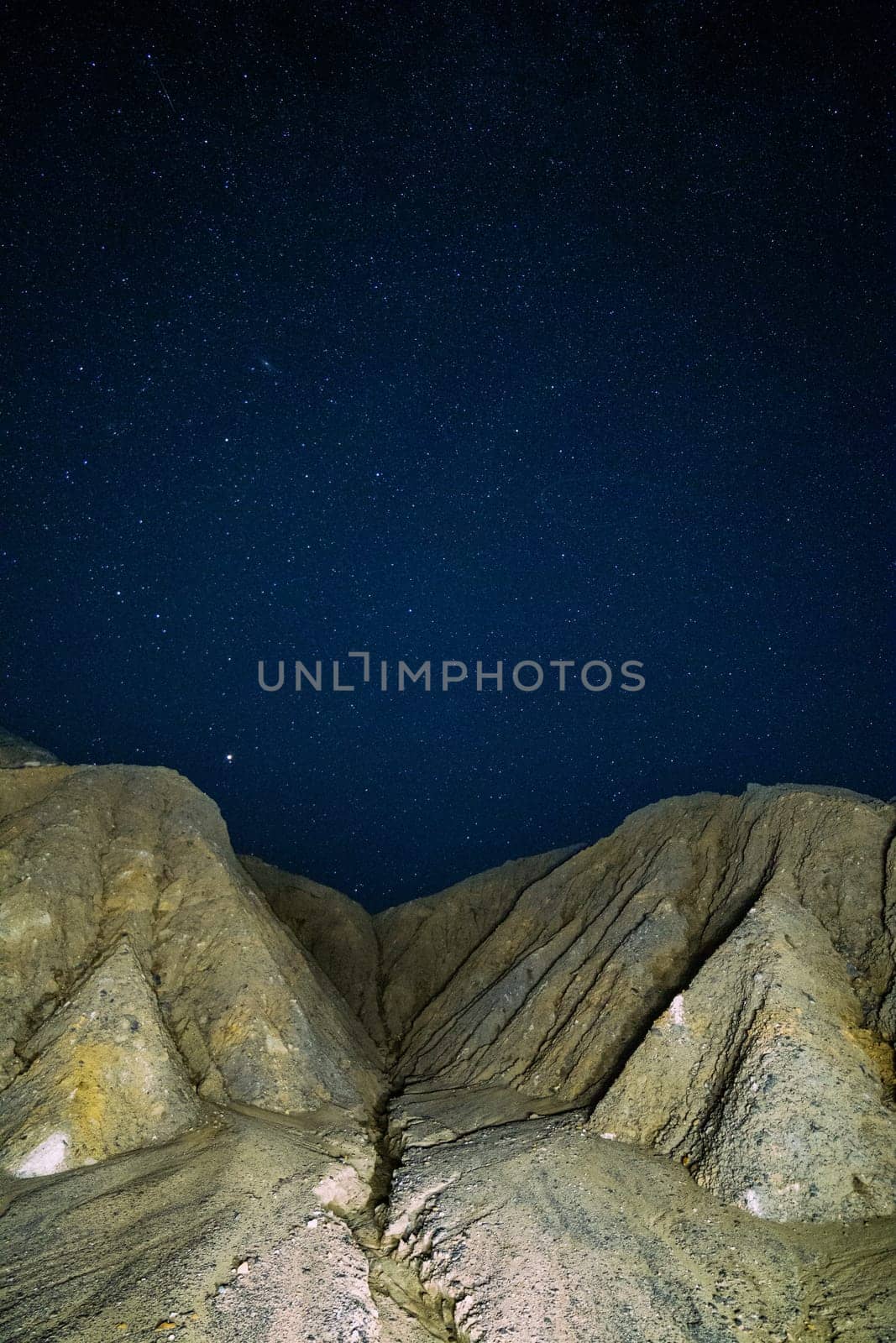 night sedimental mountains at starry night.
