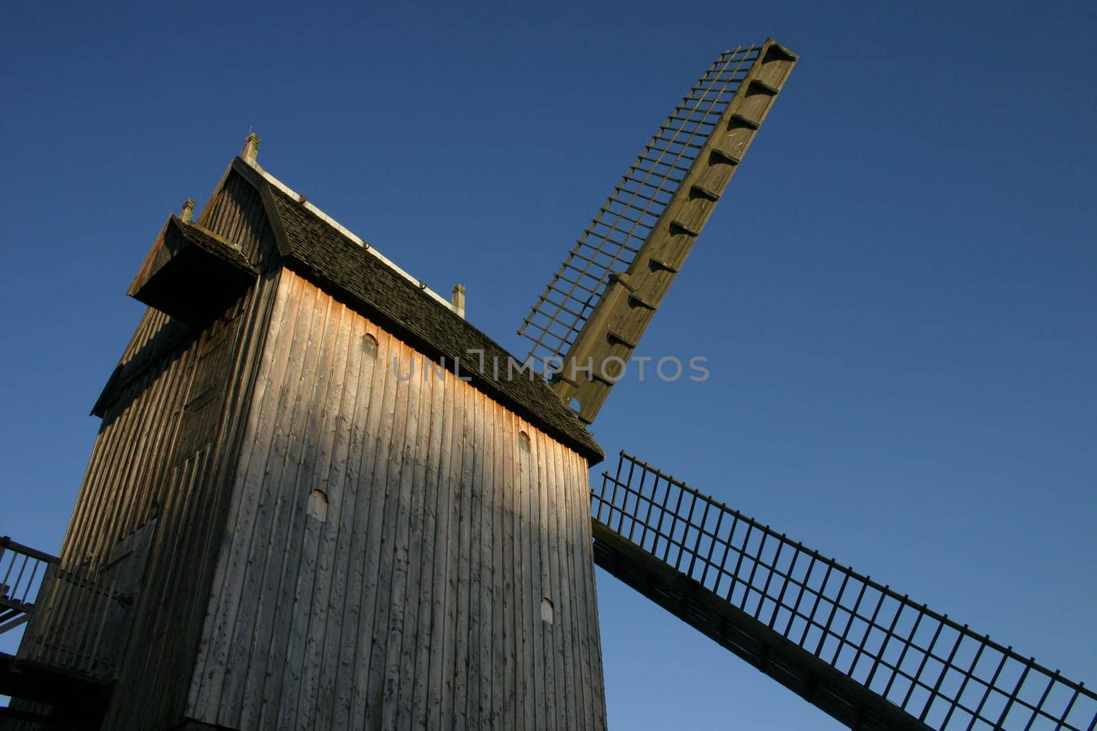 Fixed windmill in the evening sunlight