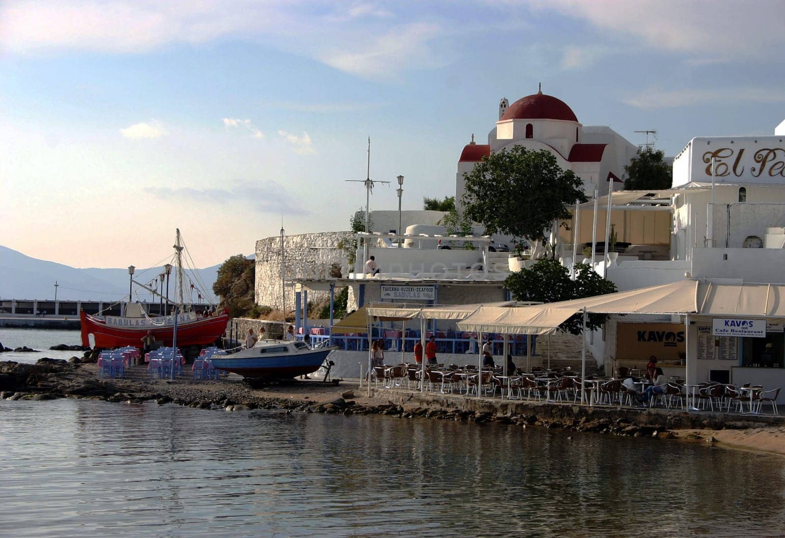 ... at sunset in the port of Mykonos.