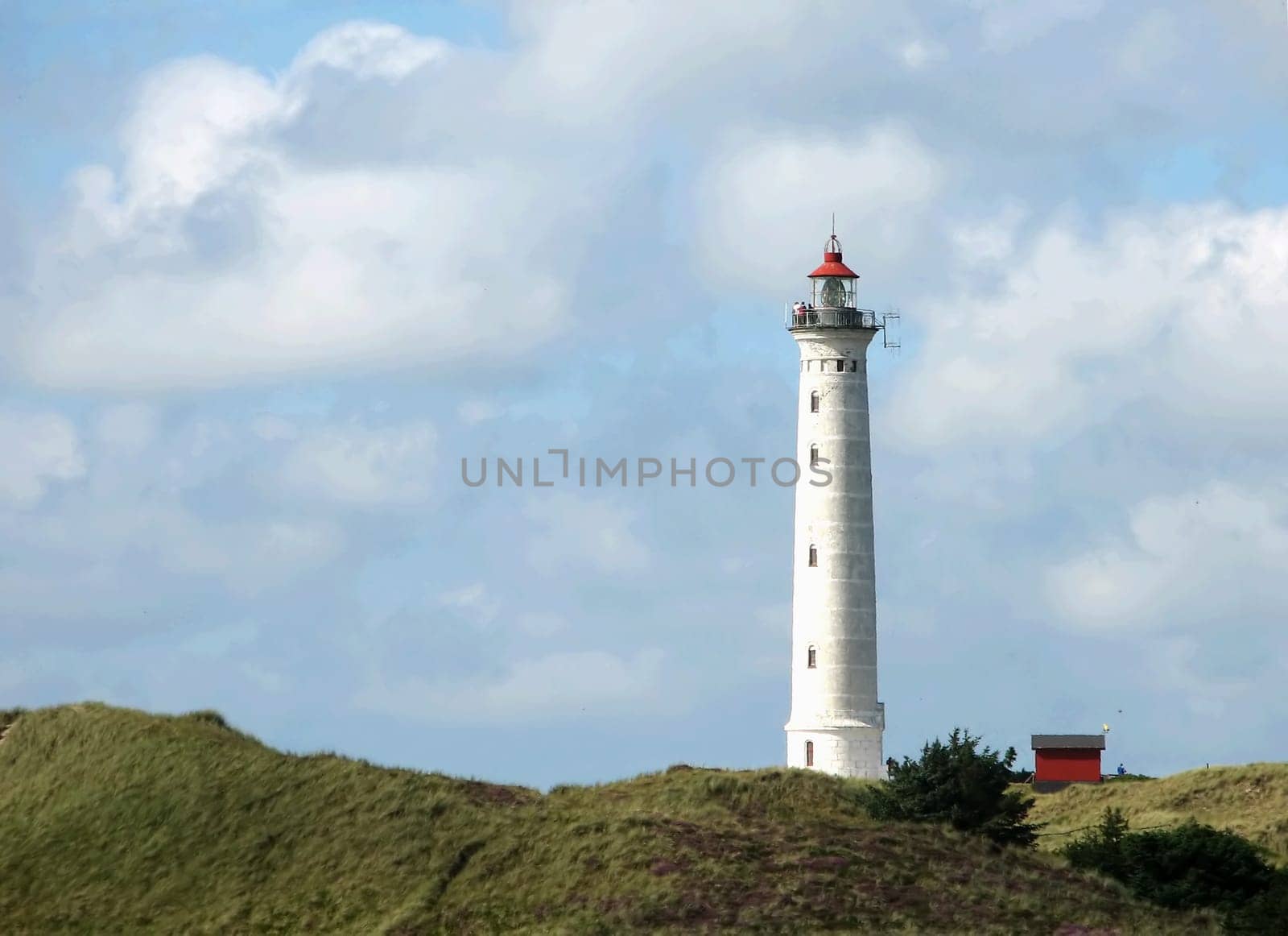 Lighthouse "Nr. Lyngvig"" near Hvide Sande.  The lighthouse flashes every 5 seconds,the flashing light is 53 m above sea level and can be seen 40 km away. The Chief Lighthouse Keeper,the highest authority of the Danish ""Office for Lighthouse Management"""