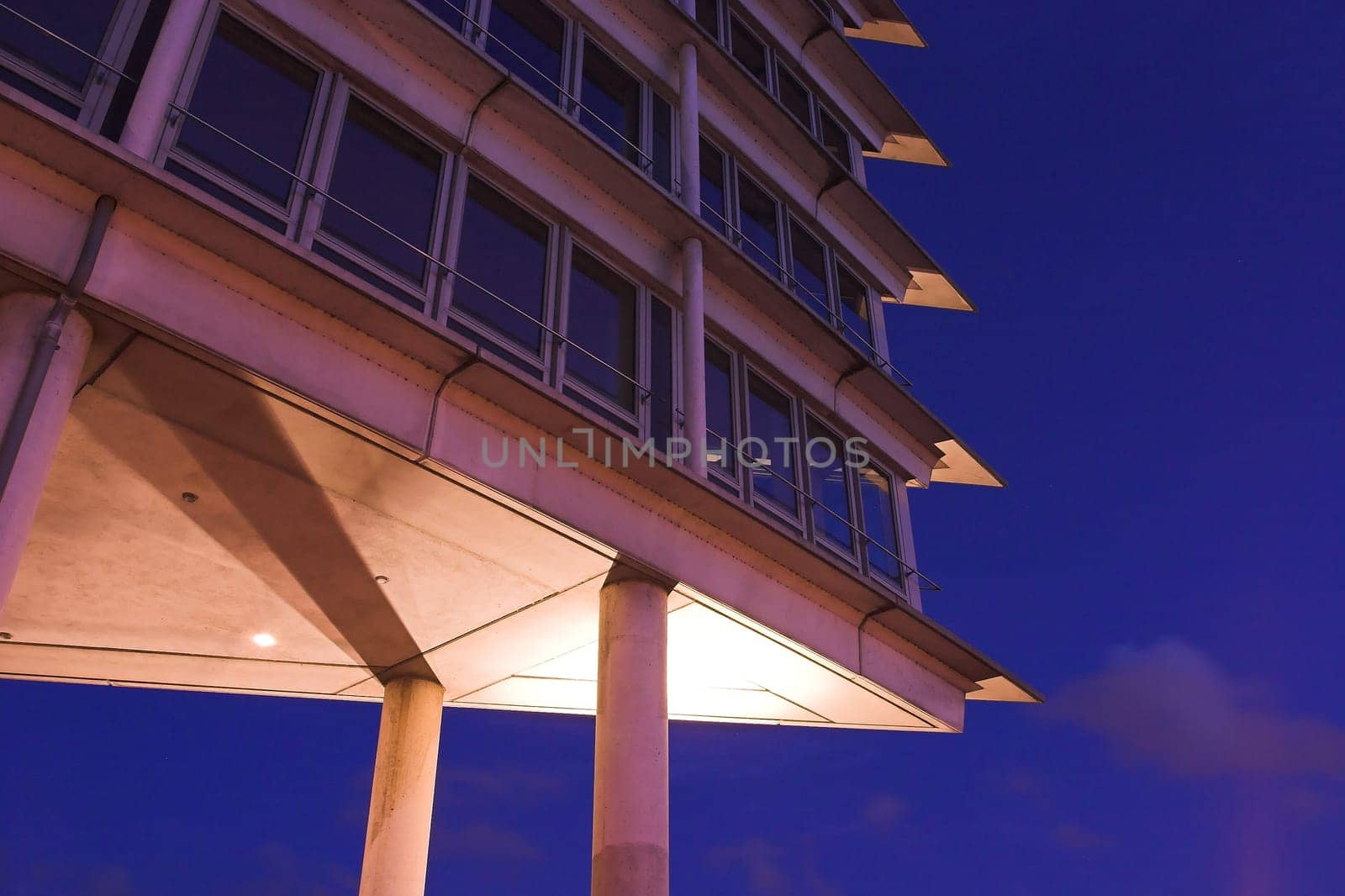 Night shot of a high-rise office building at the port of Hamburg