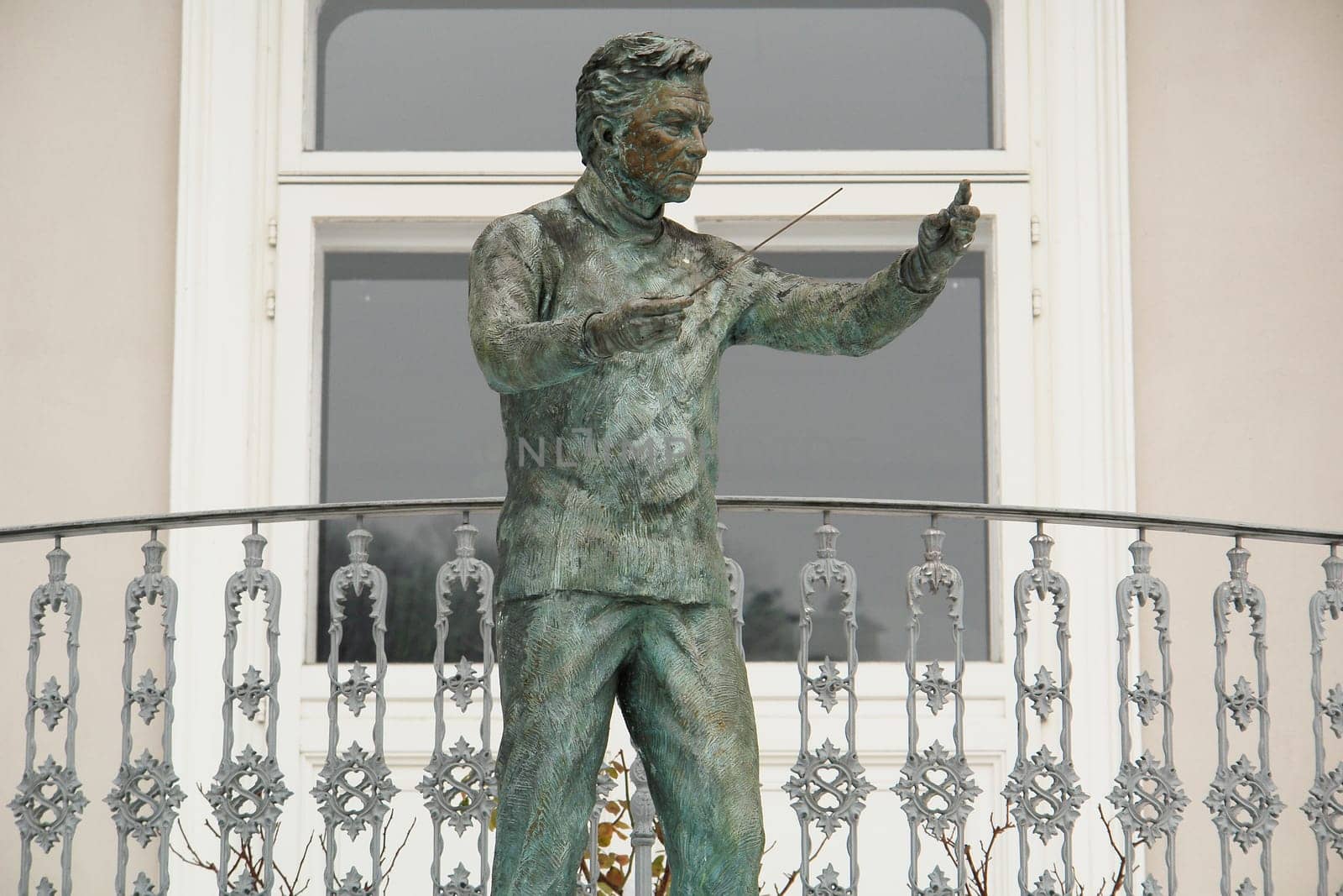 Commemorative statue in front of Herbert von Karajan's birthplace in Salzburg