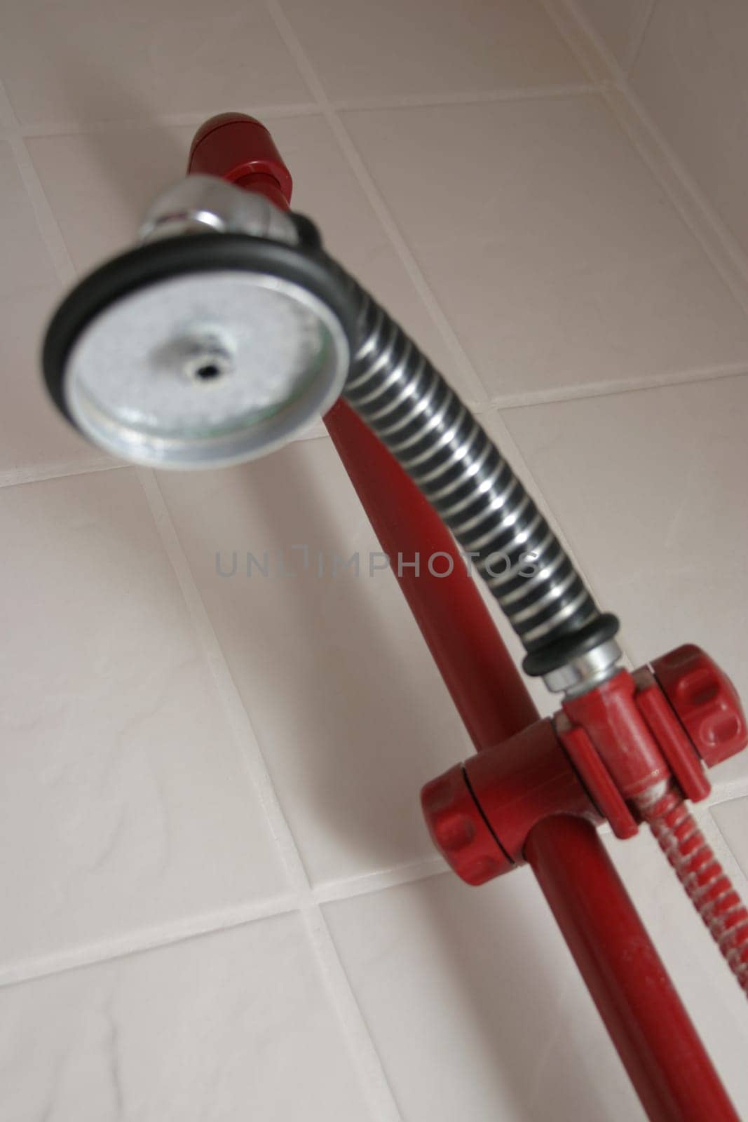 Calcified shower head of a shower