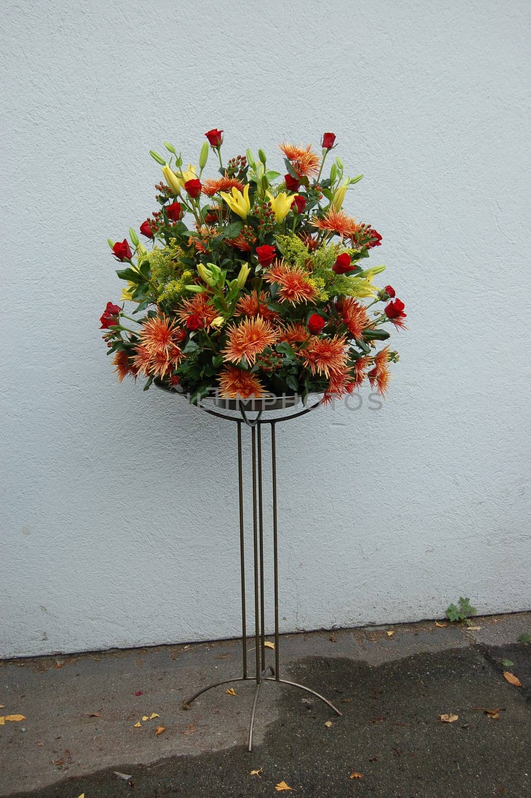 Flower arrangement red with various flowers