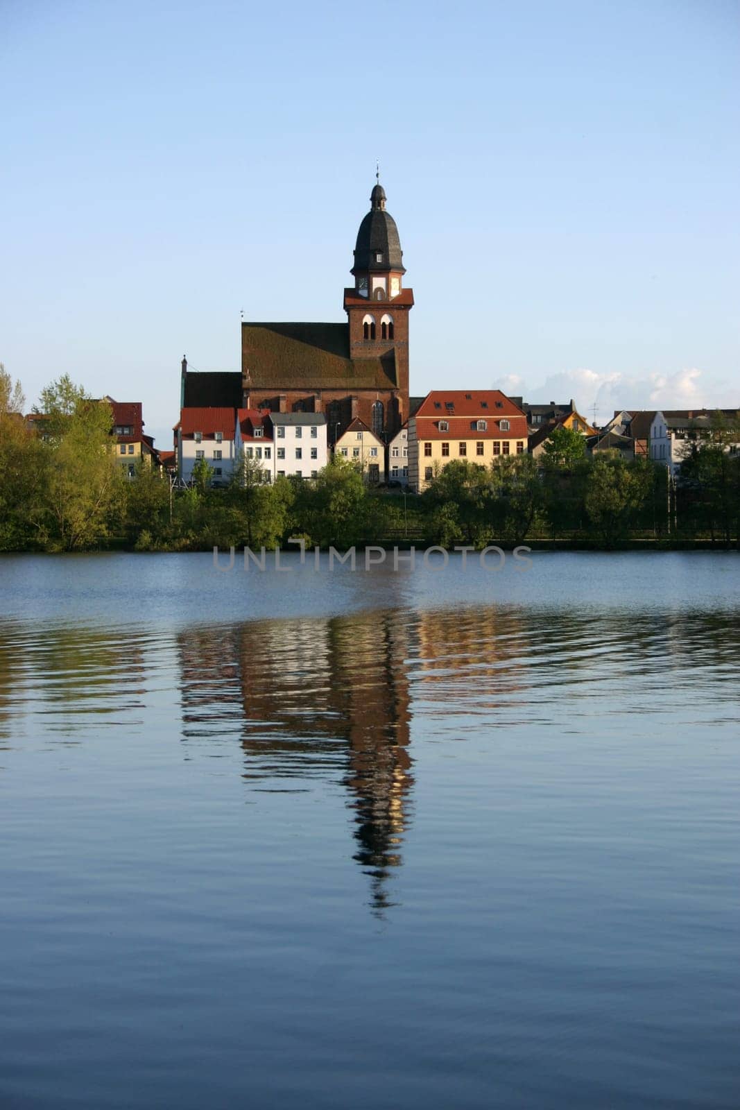 View over the Tiefwarensee to the old town of Warenr with the church of St. Mary