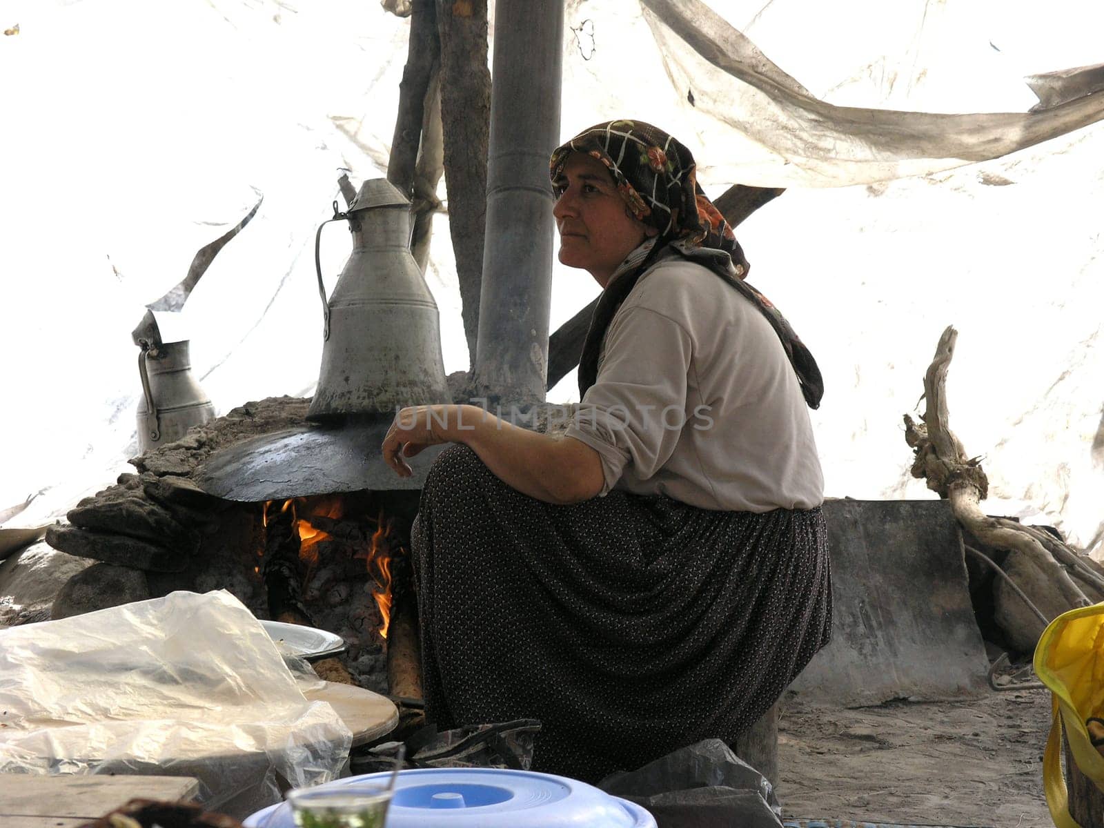 Turkish Rivera Kemer, Woman in tent baking flatbread 2448 x 1836 pixels