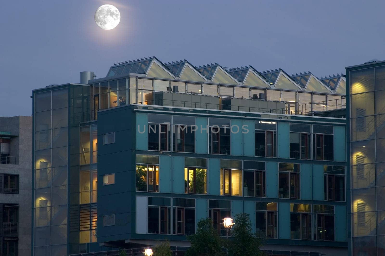 Moon over residential buildings