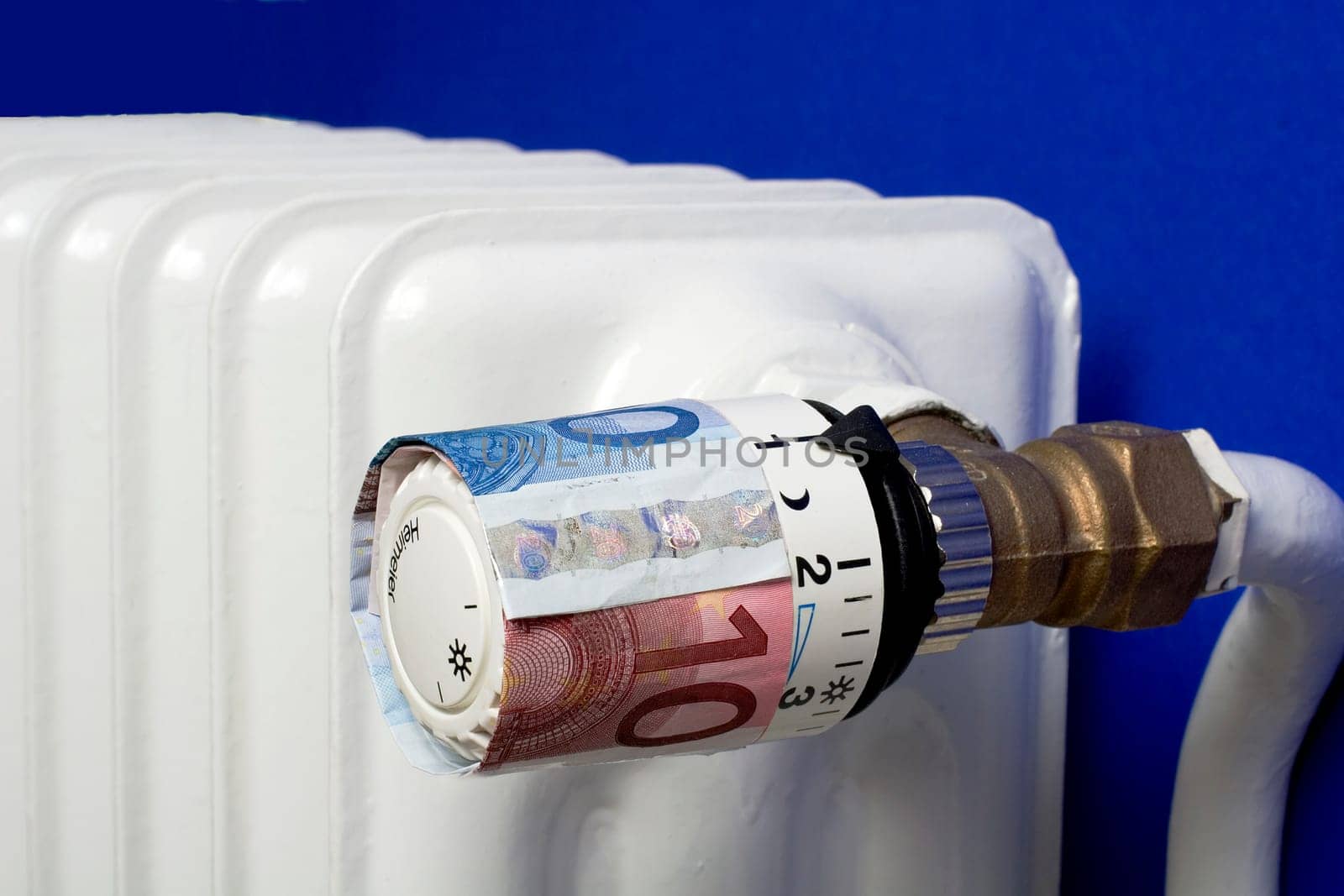 Heating thermostat with money increased heating costs