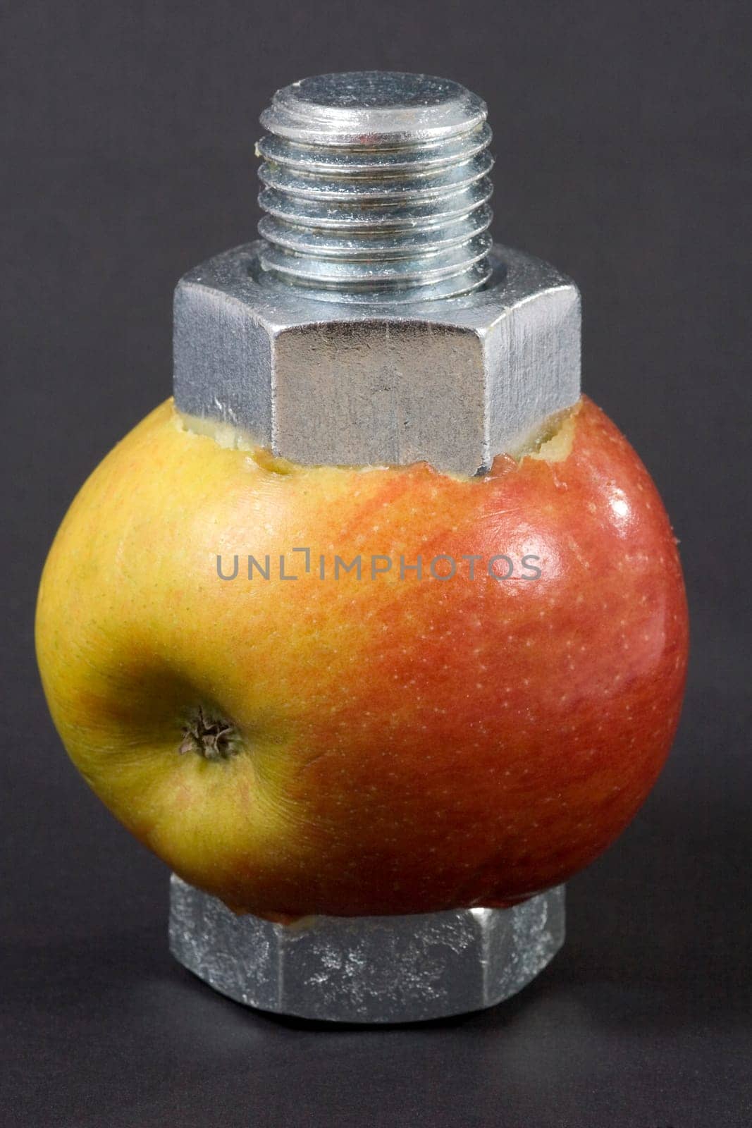 Screw through apple