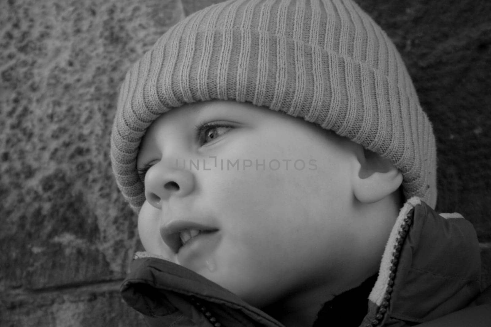 The drop on his chin comes from a snowball that he melted with his mouth. No,the snow wasn't yellow  -)