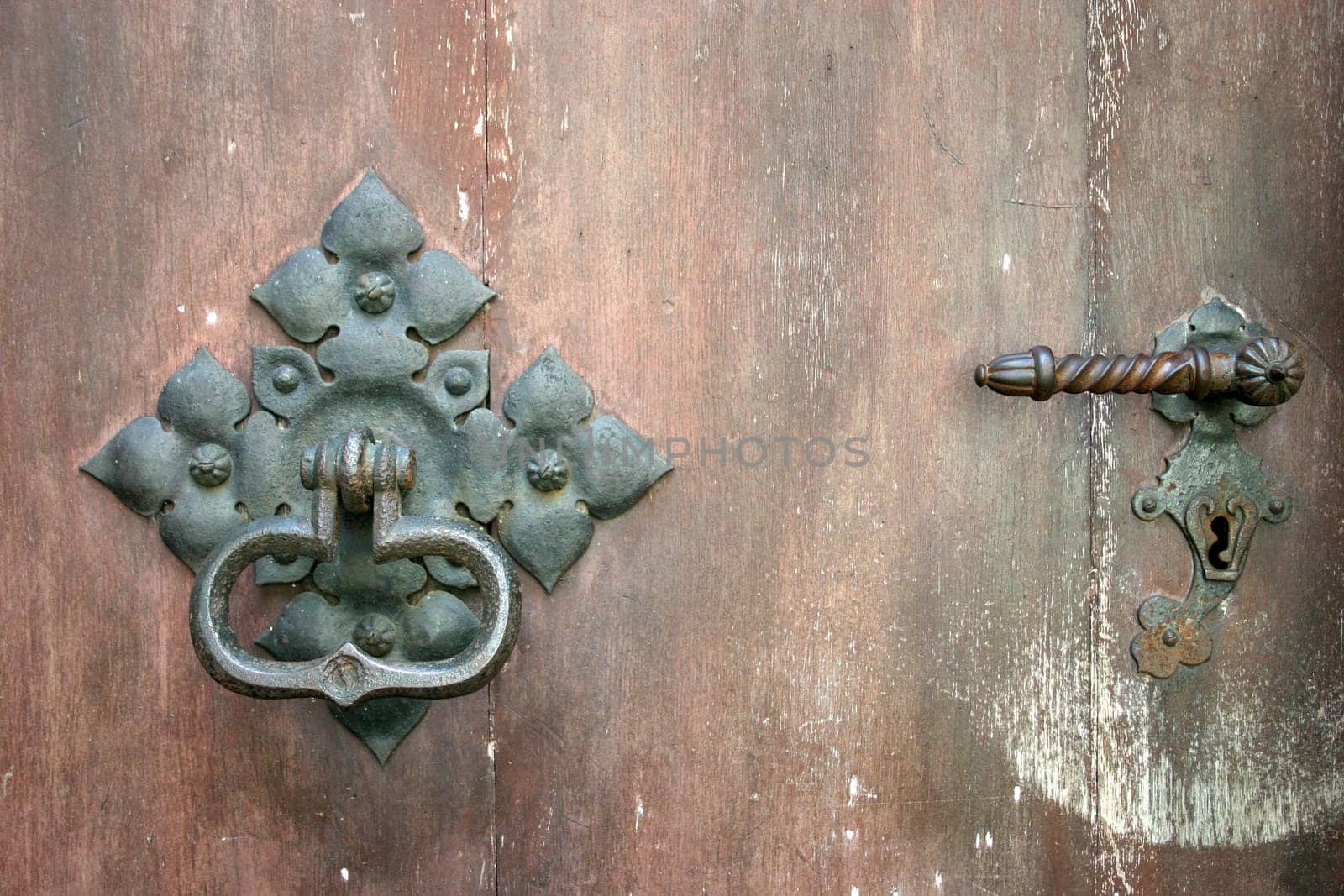 Ancient door with wrought-iron fittings