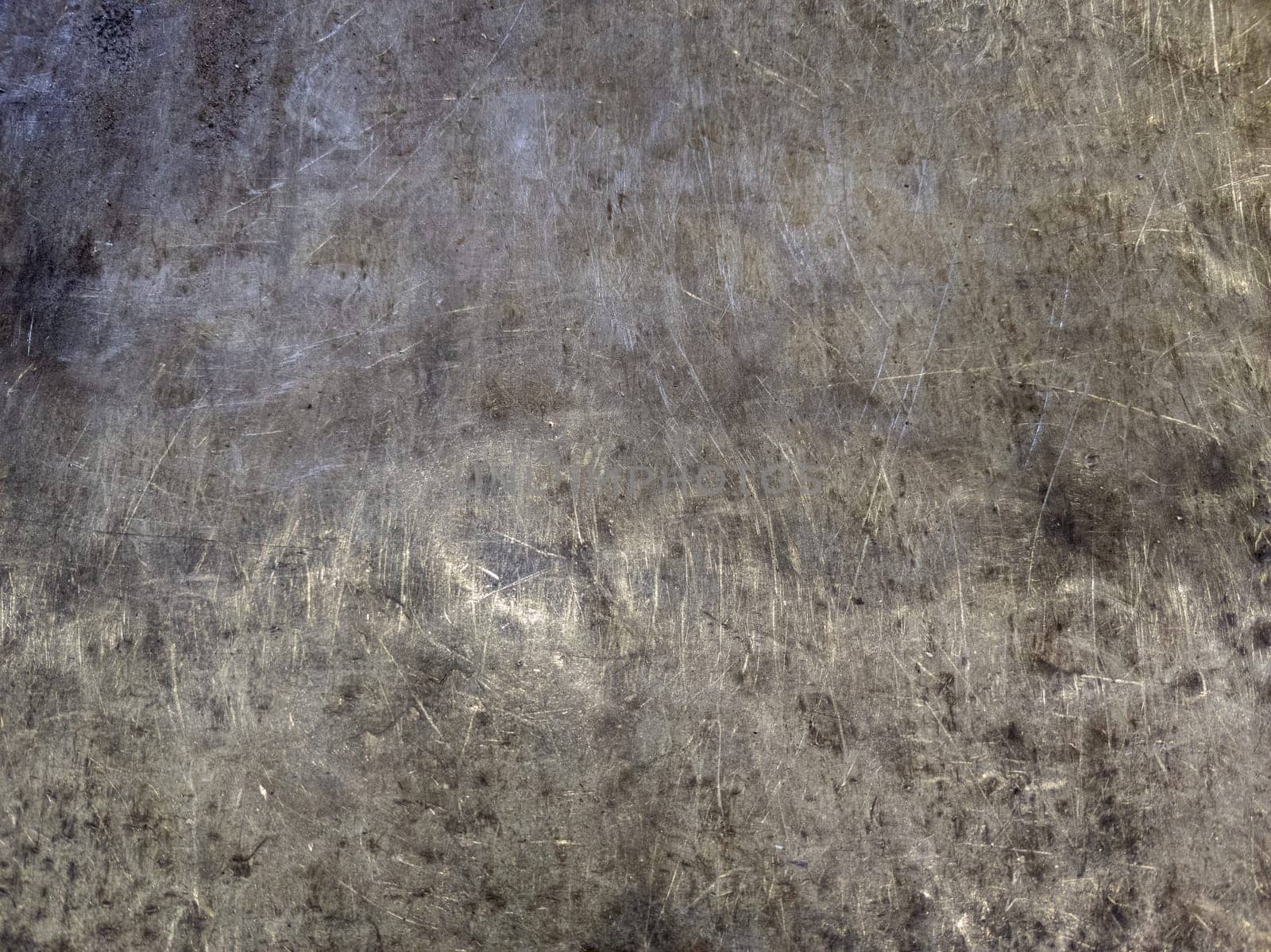 scratched beaten steel surface of workbench - texture and flat full-frame background by z1b
