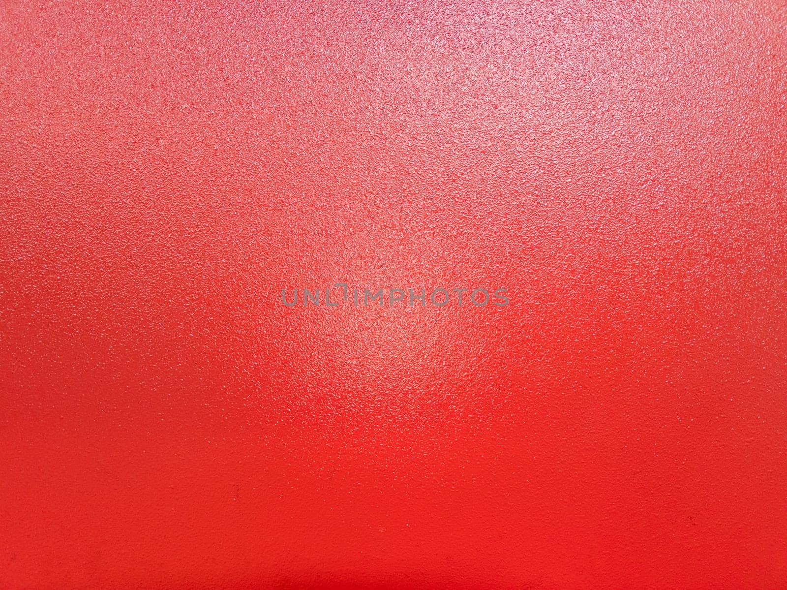 background of red shagreen powder paint coating on flat sheet steel surface by z1b