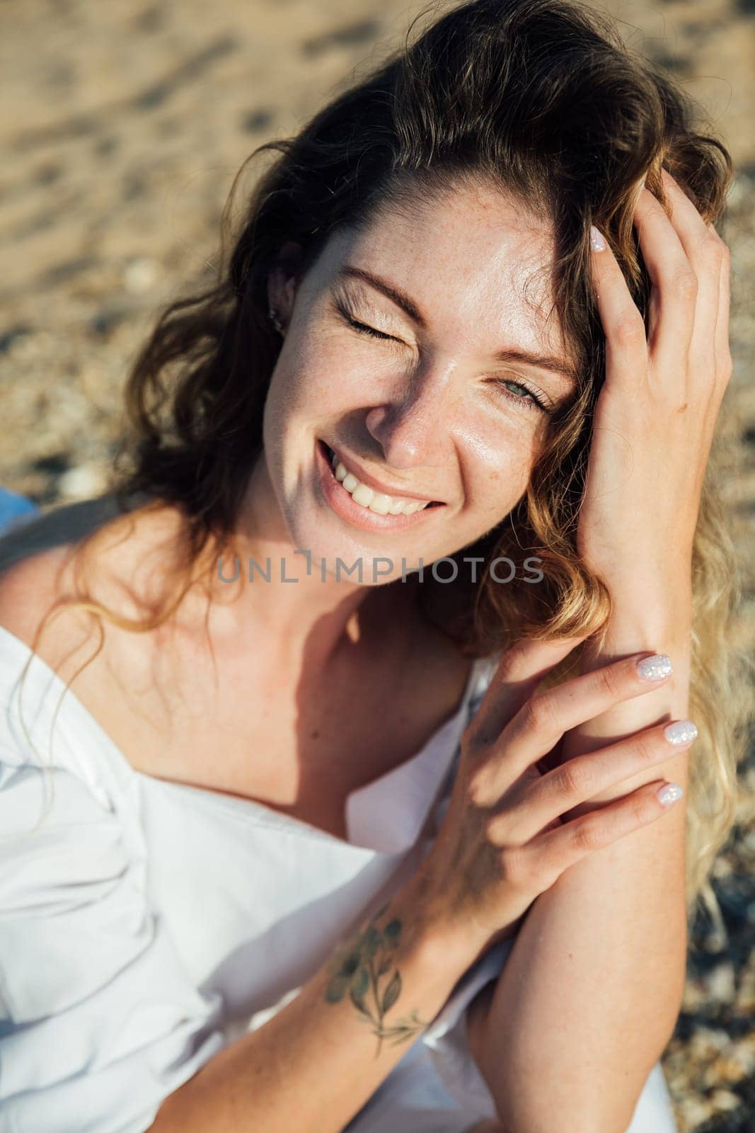 Portrait of a woman on a walk in the park on the street