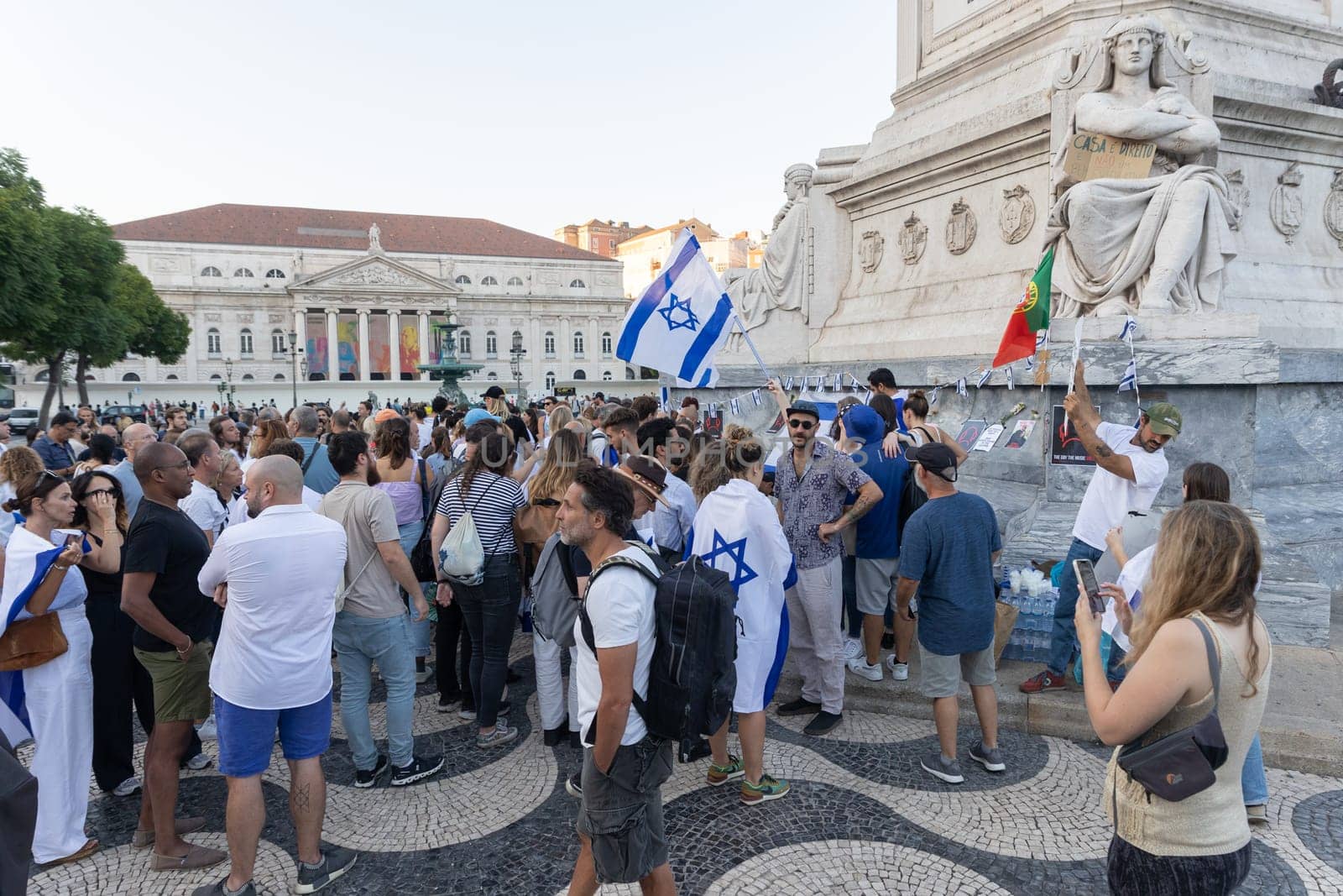 Lisbon, Portugal October 10, 2023 People with the Israel and Portugal flags standing at the memorial to the fallen Israelis in October 2023. Mid. shot