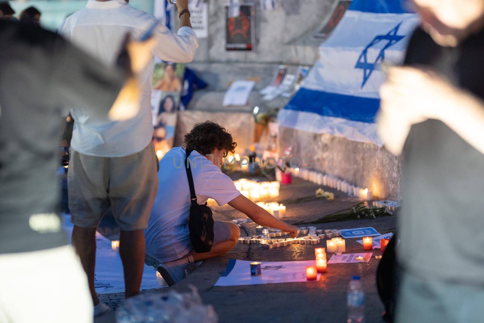 Lisbon, Portugal October 10, 2023. People, flowers and candles at the memorial to the fallen Israelis in October 2023