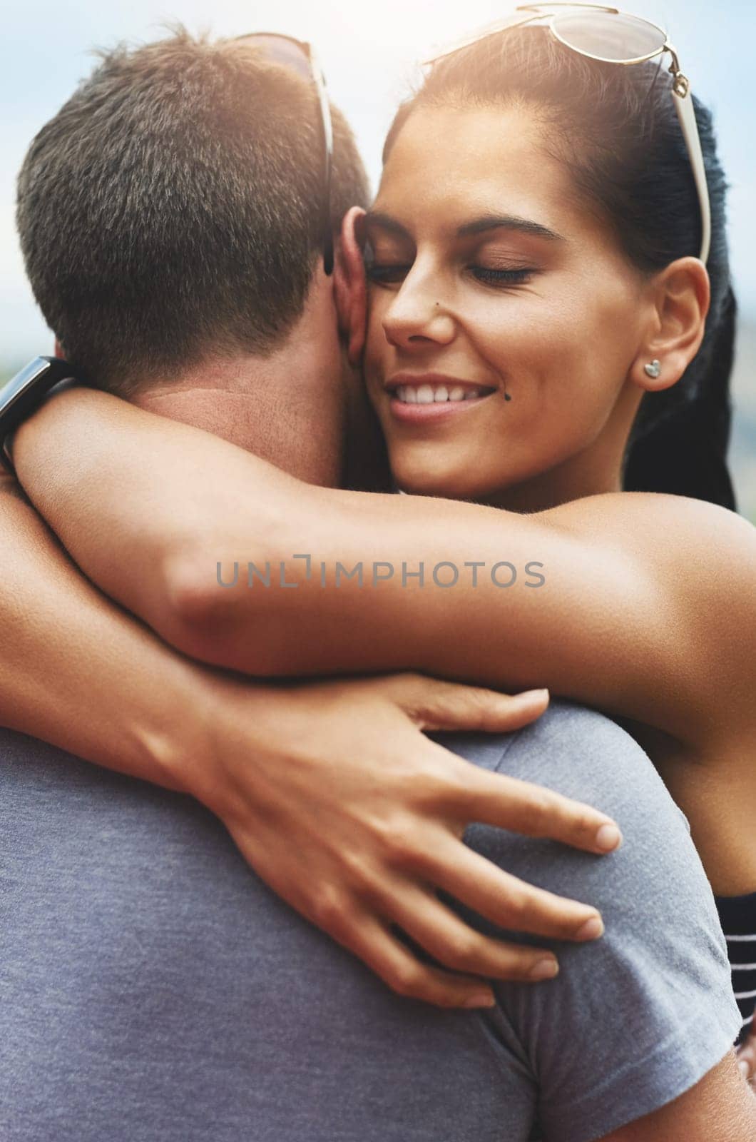 Support, love or couple hug on outdoor date for romance or care in summer with freedom to relax. Embrace, peace or romantic man or happy woman on holiday vacation together to bond or travel in USA.