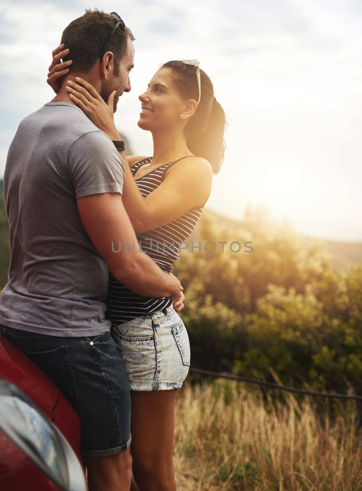 Road trip, love or happy couple hug in nature for date, support or care on a summer break or park adventure. Freedom, man or woman on outdoor holiday vacation together to bond, relax or travel in USA.