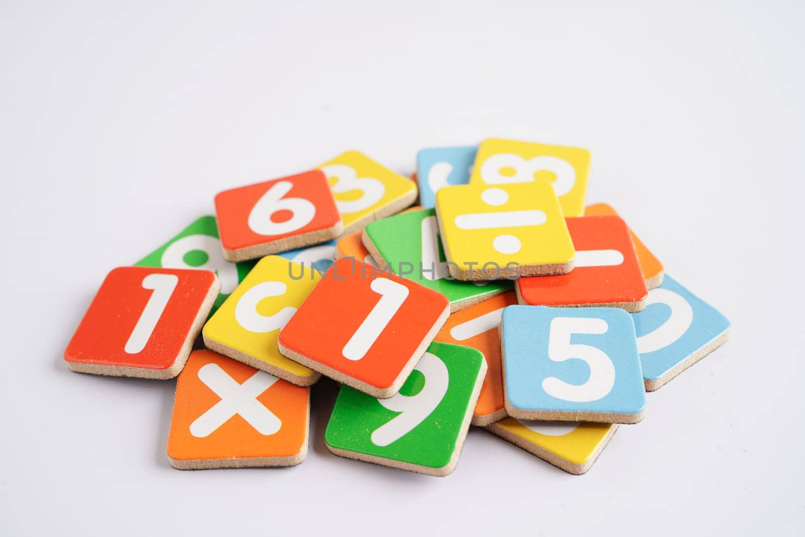 Number wood block cubes for learning Mathematic, education math concept.