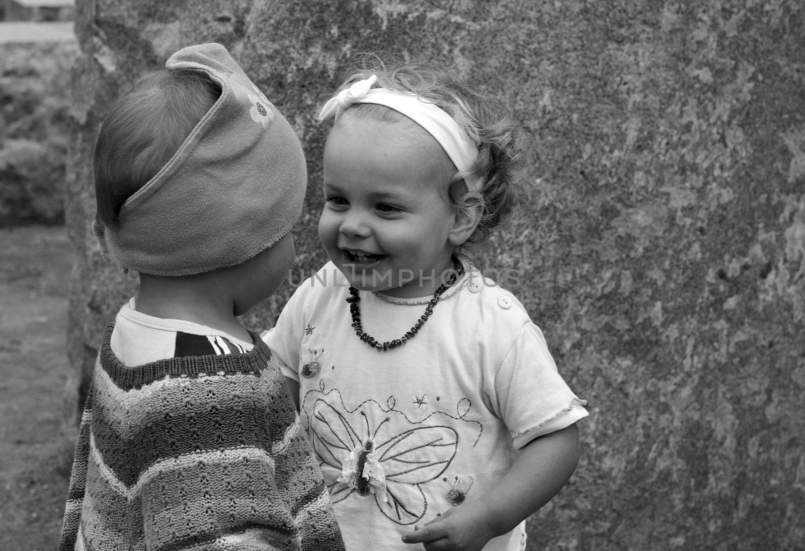 Two toddlers get to know each other