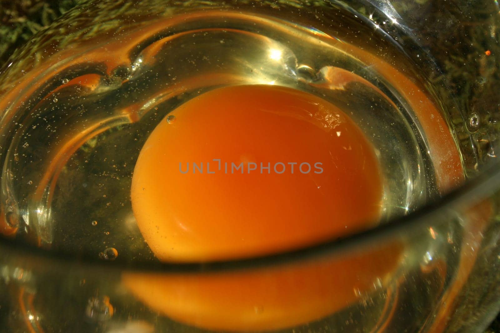 Cracked egg in a jar