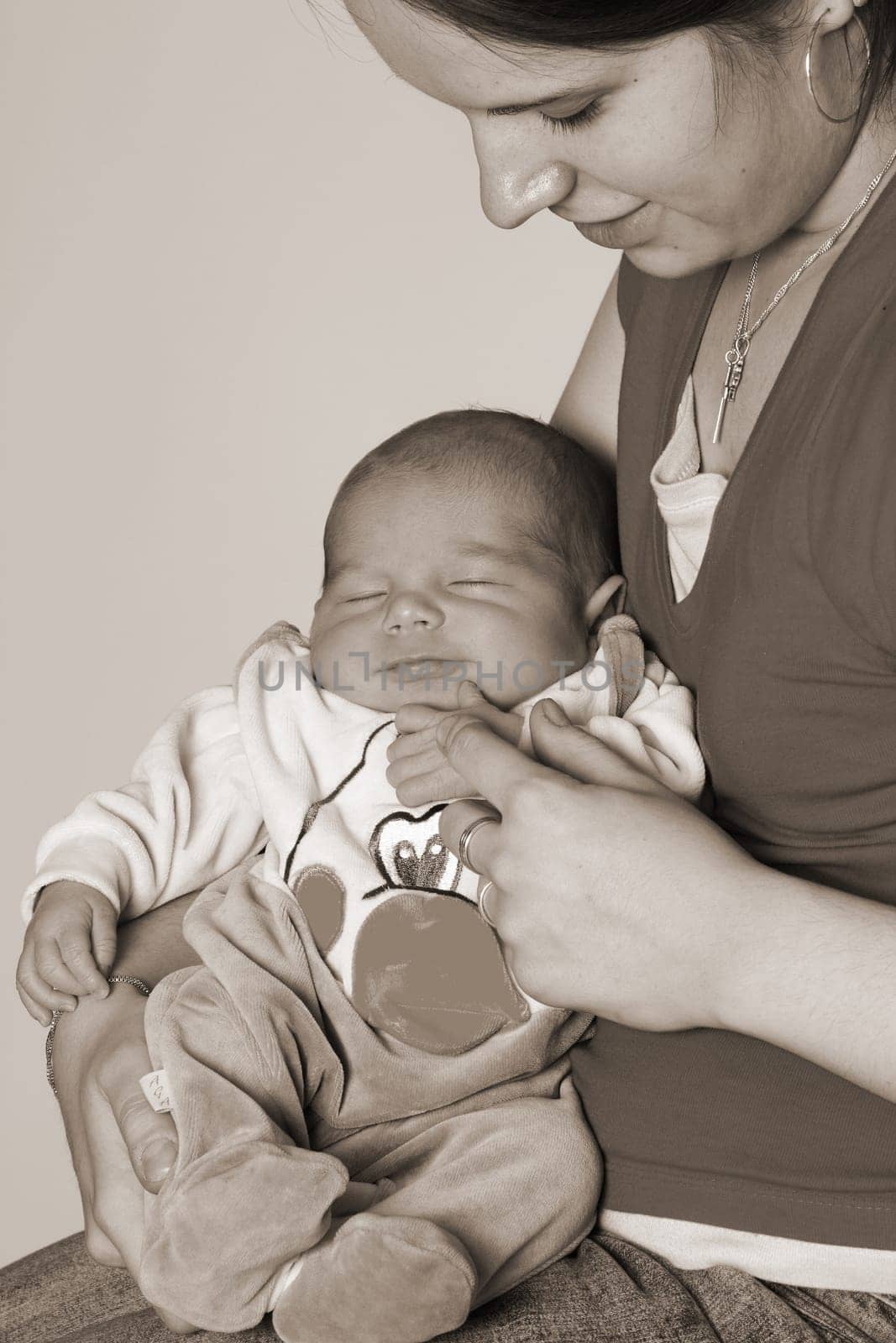 Photos shows a satisfied smiling baby after eating