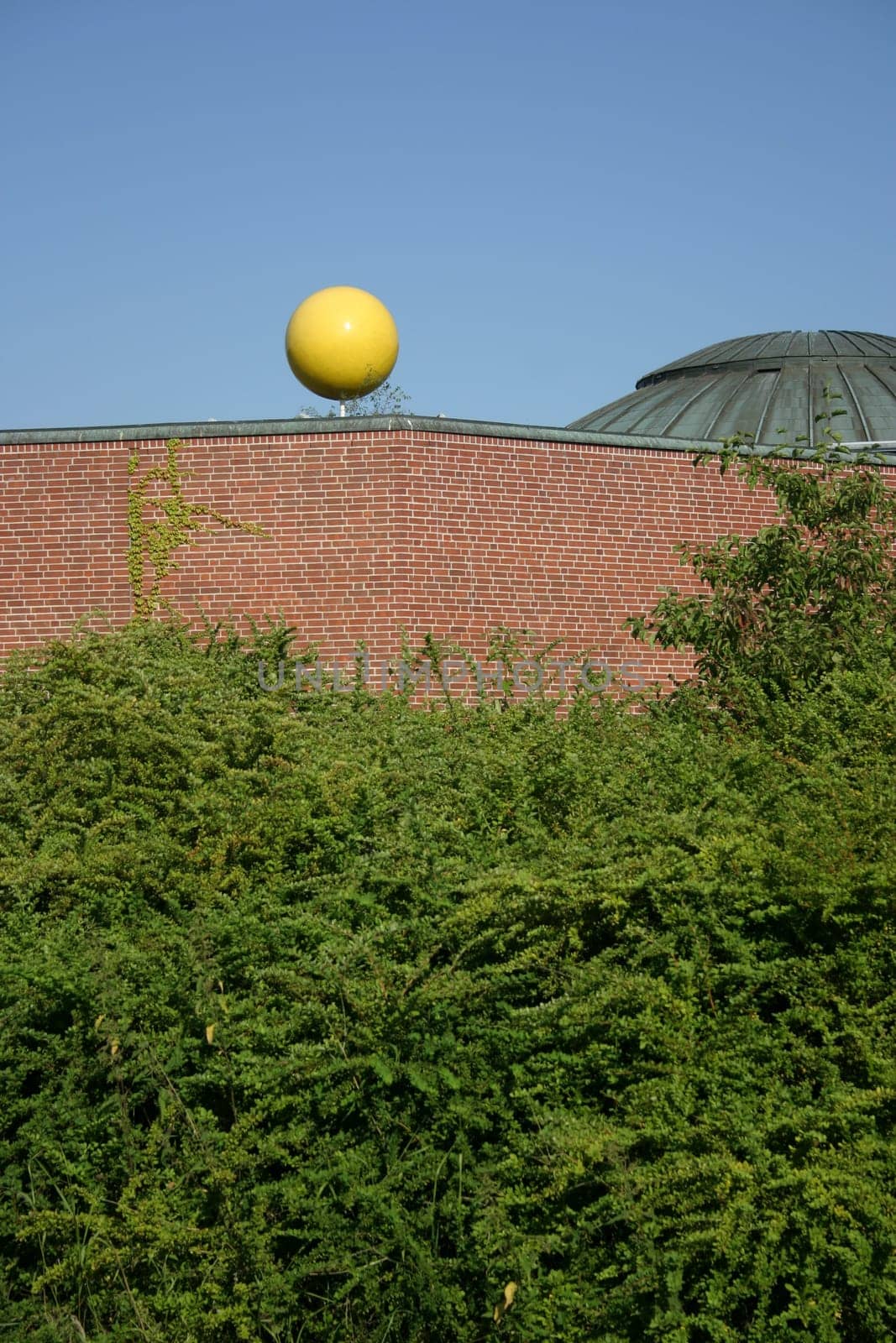 Dome of the planetarium in the Natural History Museum Münster. The yellow sphere represents the sun and is also the end point of the so-called planetary path.